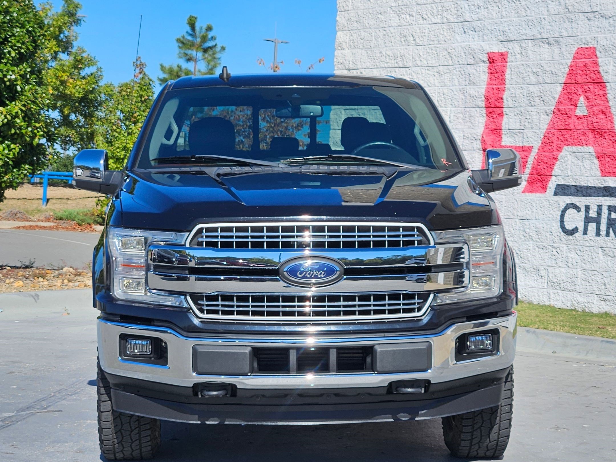 Used 2019 Ford F-150 Lariat with VIN 1FTEW1E44KKE56614 for sale in Little Rock