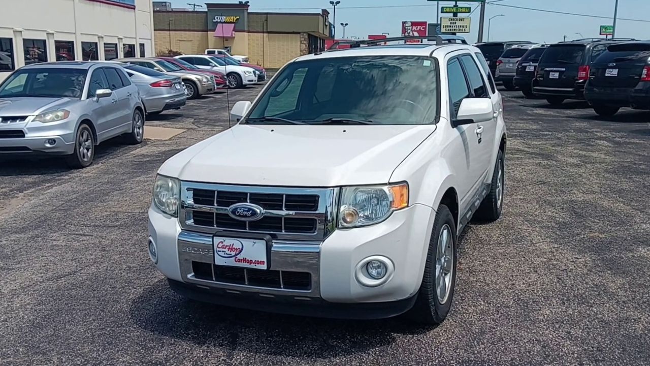 PreOwned 2011 Ford Escape LIMITED SPORT UTILIT 4D SUV FWD Y948403 in