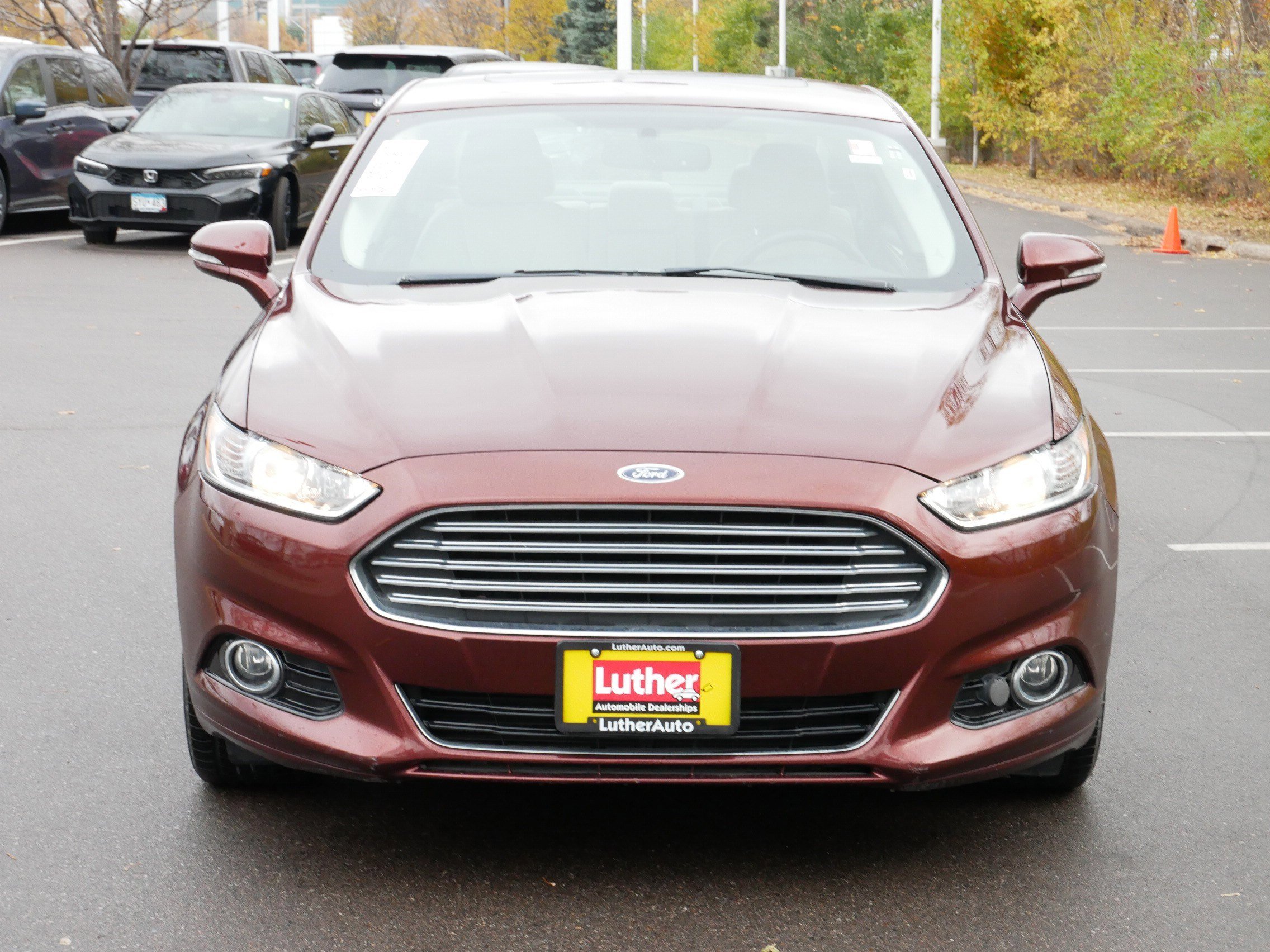 Used 2015 Ford Fusion Hybrid Titanium with VIN 3FA6P0RUXFR305368 for sale in Hopkins, Minnesota
