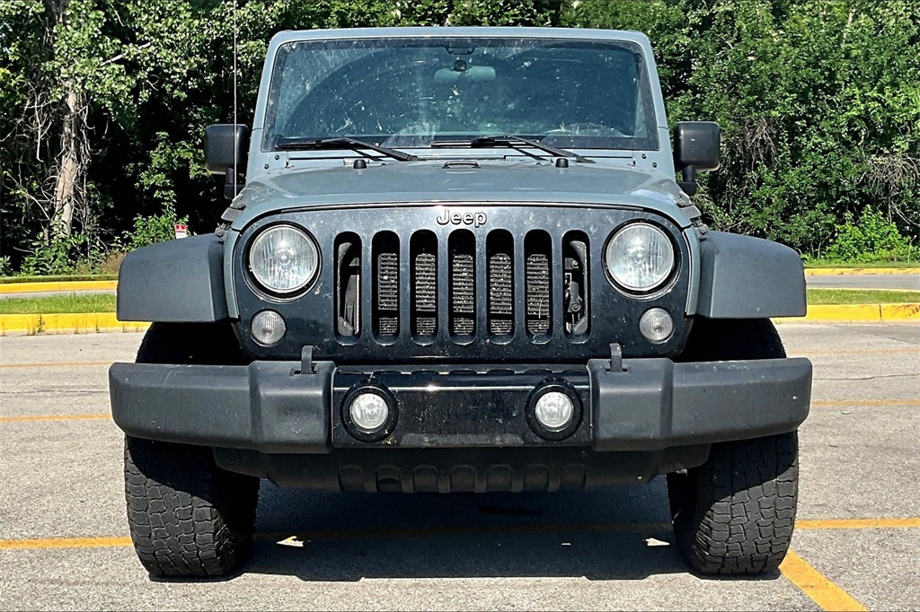 Used 2015 Jeep Wrangler Willys Wheeler with VIN 1C4AJWAG4FL624830 for sale in Kansas City