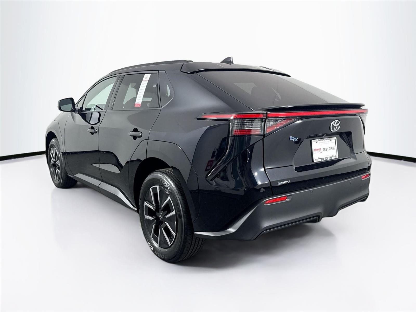 Certified 2026 Toyota bZ XLE with VIN JTMBFAEB0TA001946 for sale in Cumming, GA