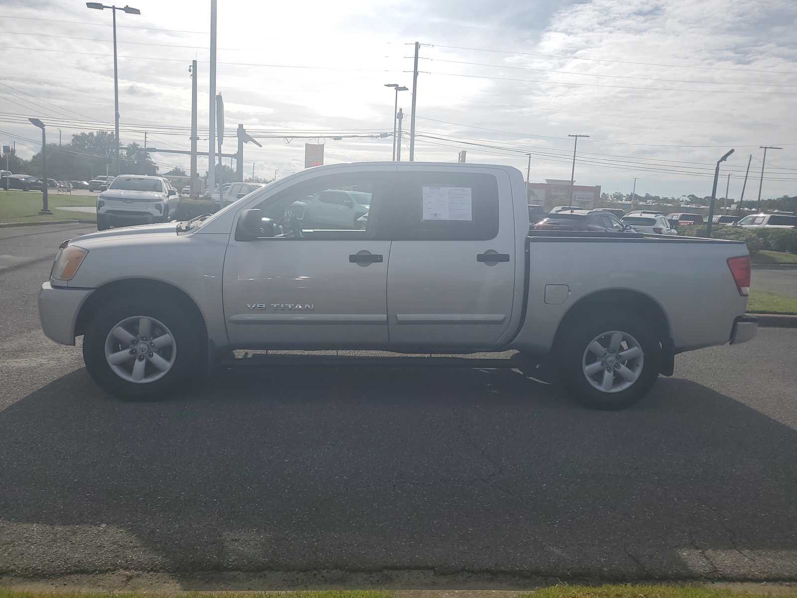 Used 2011 Nissan Titan SV with VIN 1N6BA0EK4BN323017 for sale in Panama City, FL