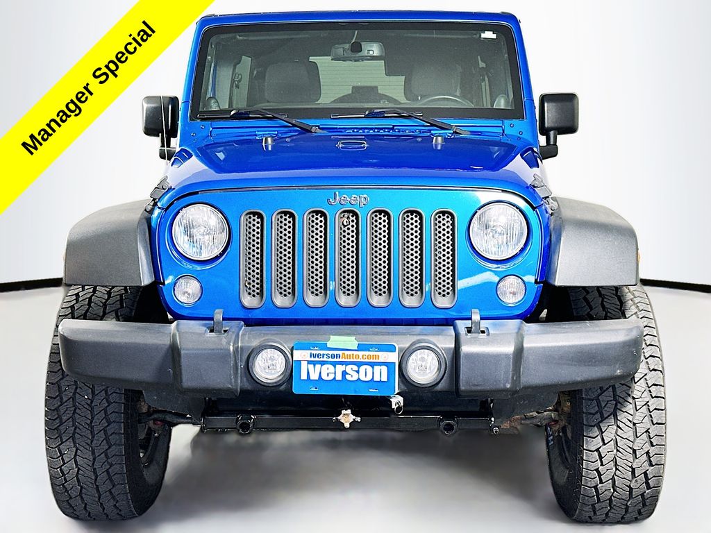 Used 2014 Jeep Wrangler Unlimited Sport with VIN 1C4HJWDG5EL235512 for sale in Huron, SD