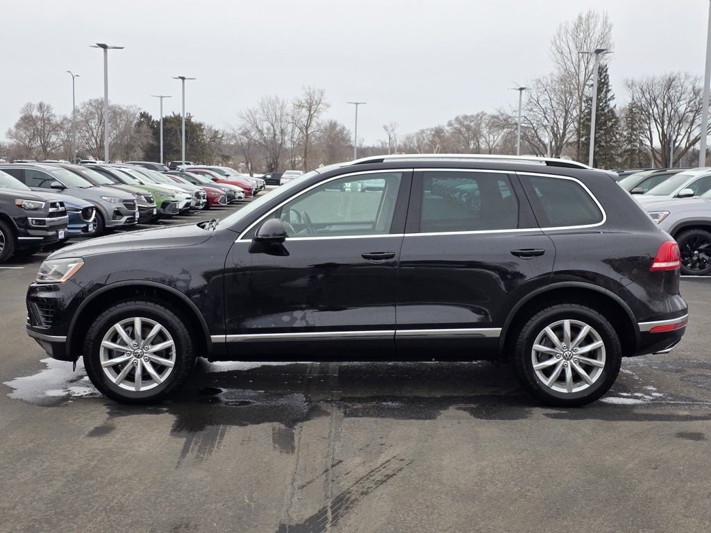 Used 2015 Volkswagen Touareg Sport with VIN WVGEF9BP5FD006750 for sale in St. Cloud, Minnesota
