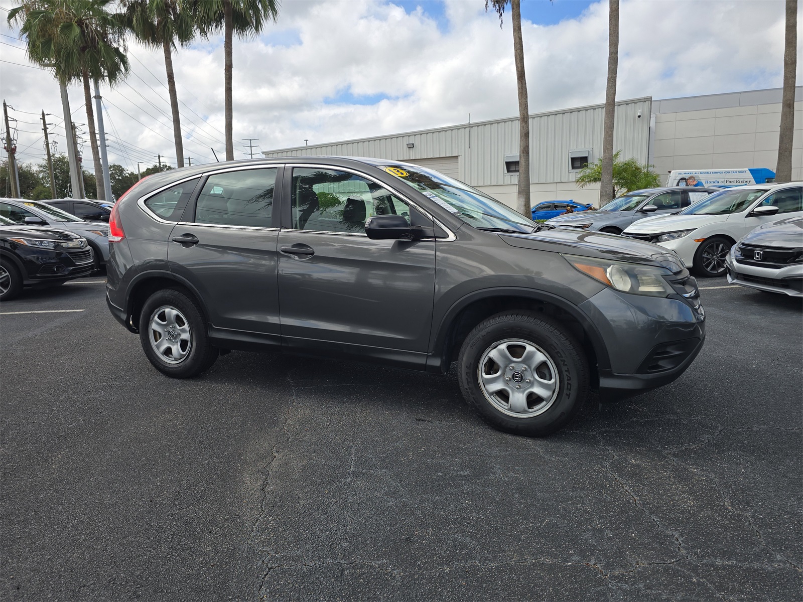 Used 2013 Honda CR-V LX with VIN 5J6RM3H32DL000768 for sale in Port Richey, FL