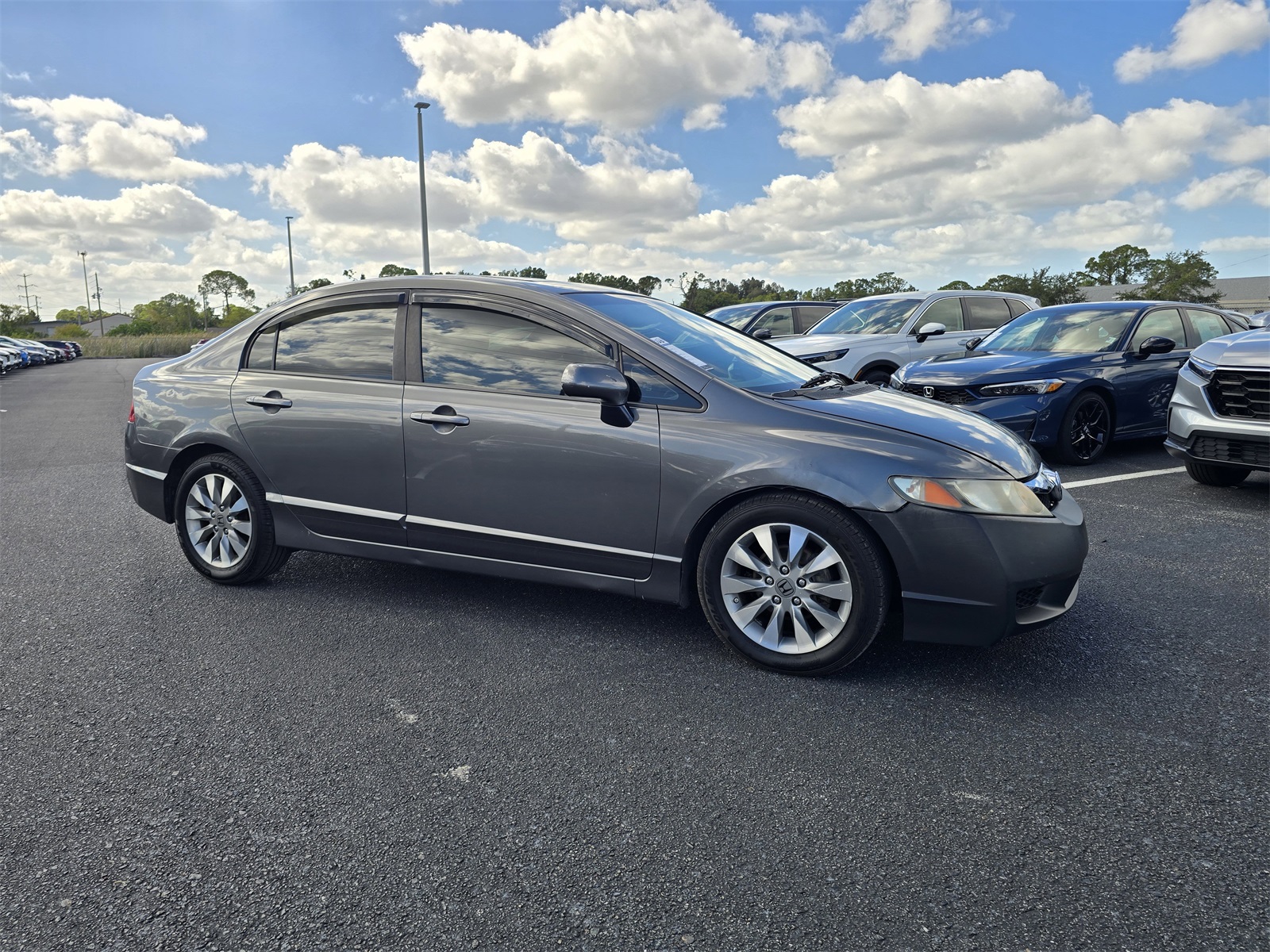 Used 2010 Honda Civic EX with VIN 19XFA1F87AE061476 for sale in Port Richey, FL