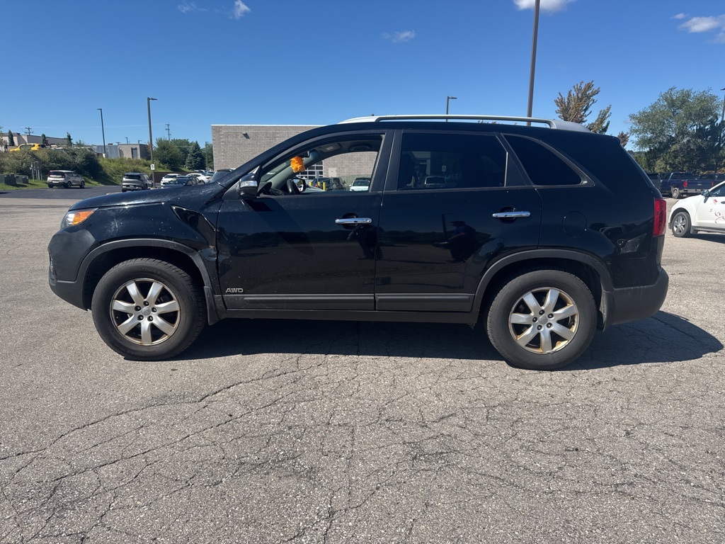Used 2013 Kia Sorento LX with VIN 5XYKTDA22DG416509 for sale in Traverse City, MI