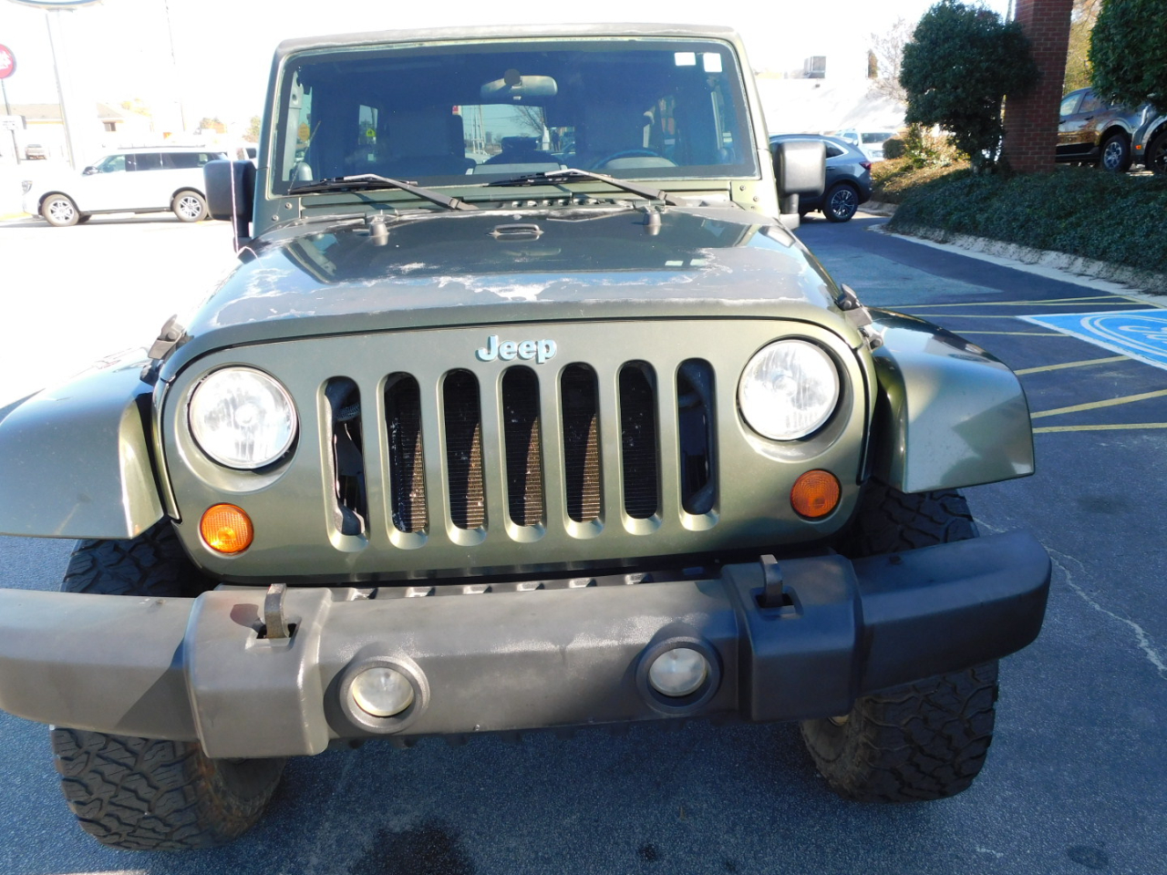 Used 2007 Jeep Wrangler Unlimited Sahara with VIN 1J8GA59117L212573 for sale in Hawkinsville, GA