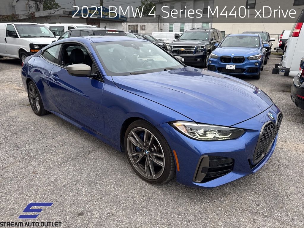 Used 2021 Blue BMW M440i xDrive image 1