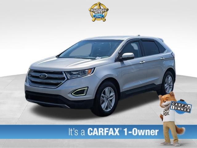 Used 2015 Ingot Silver Ford SEL image 1