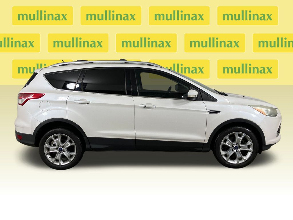 Used 2014 Ford Escape Titanium with VIN 1FMCU0J98EUC65078 for sale in Vero Beach, FL
