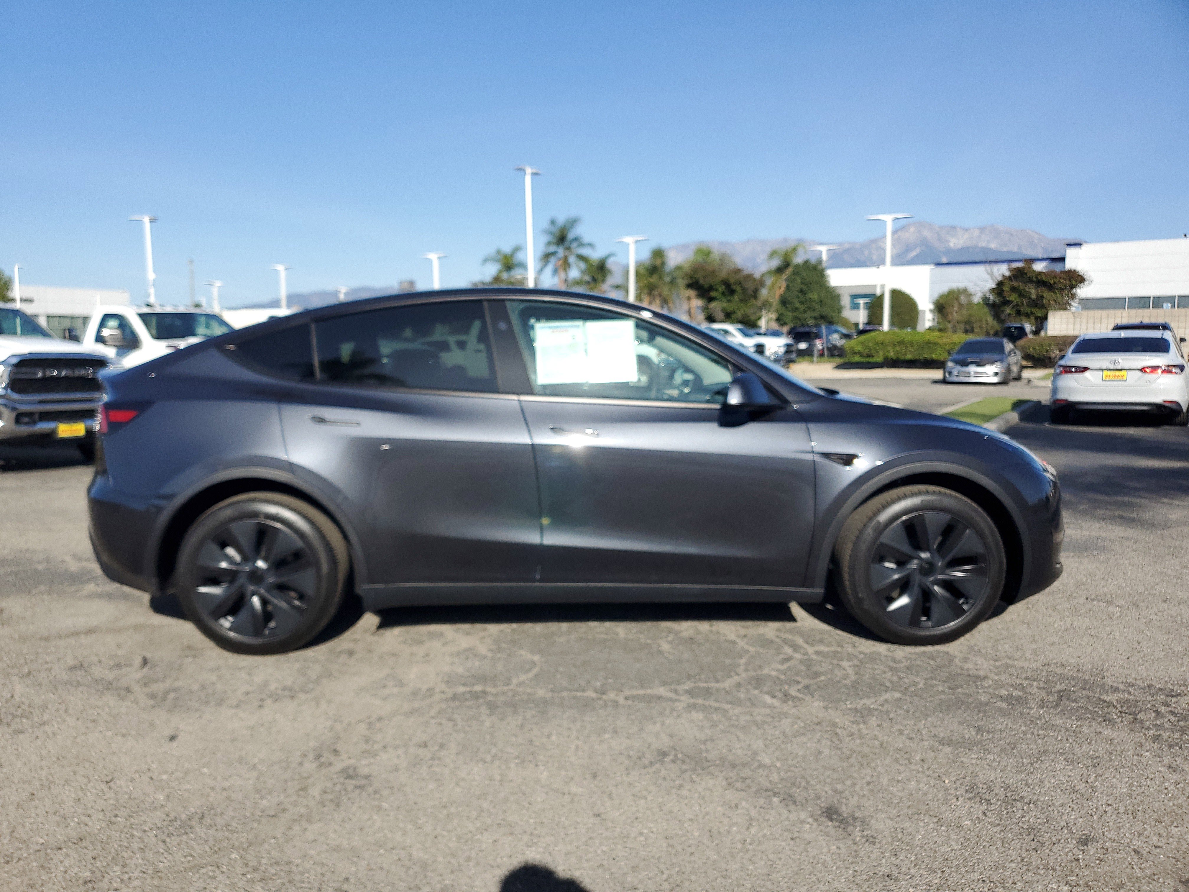 Used 2025 Tesla Model Y Long Range with VIN 7SAYGDED0SF225303 for sale in Fontana, CA
