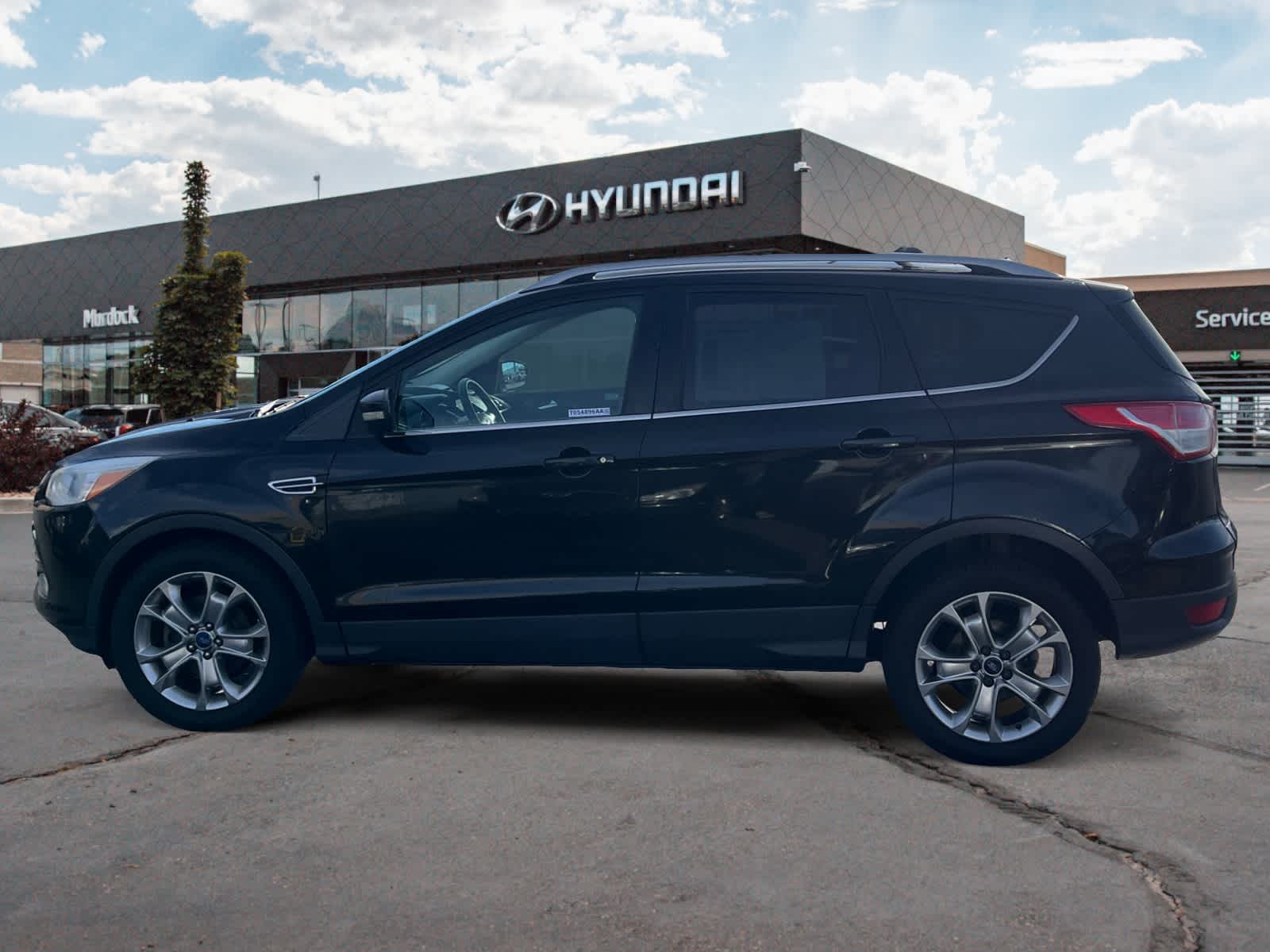 Used 2014 Ford Escape Titanium with VIN 1FMCU0JX2EUD09848 for sale in Lindon, UT
