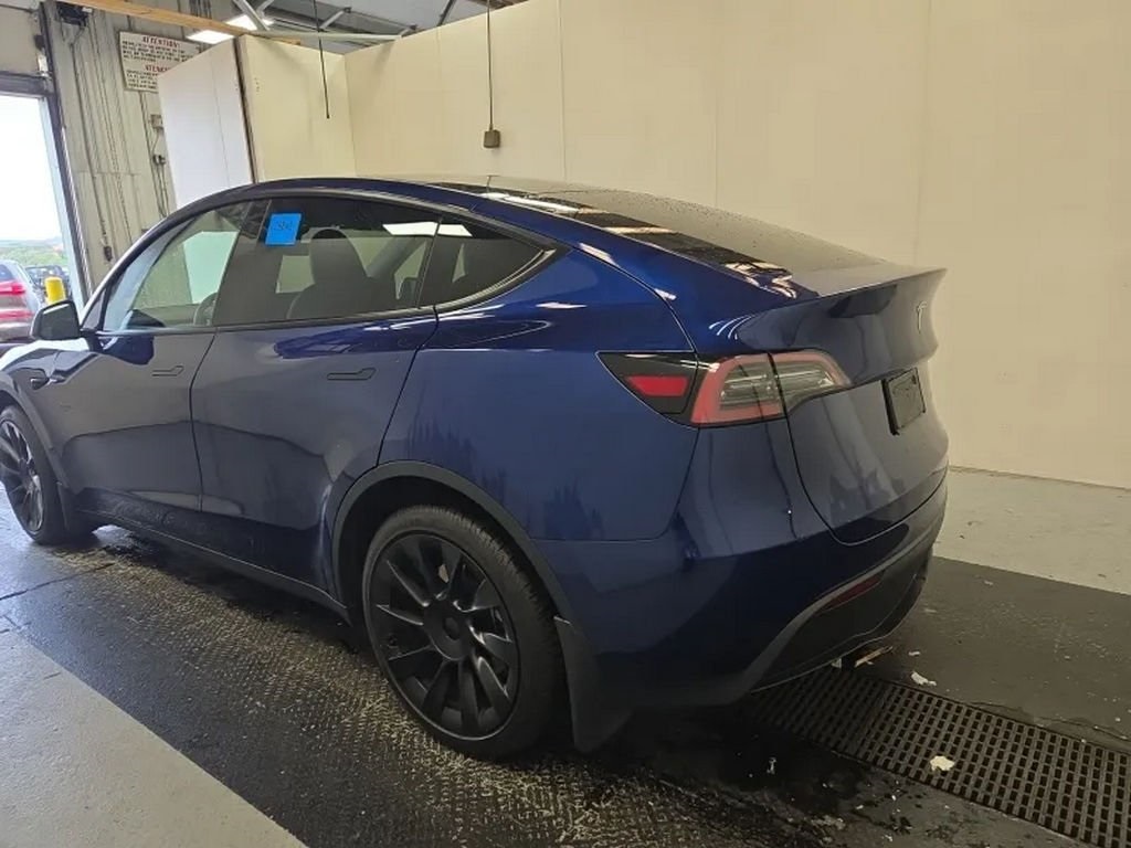 Used 2023 Tesla Model Y Long Range with VIN 7SAYGDEEXPA051303 for sale in Northfield, Minnesota
