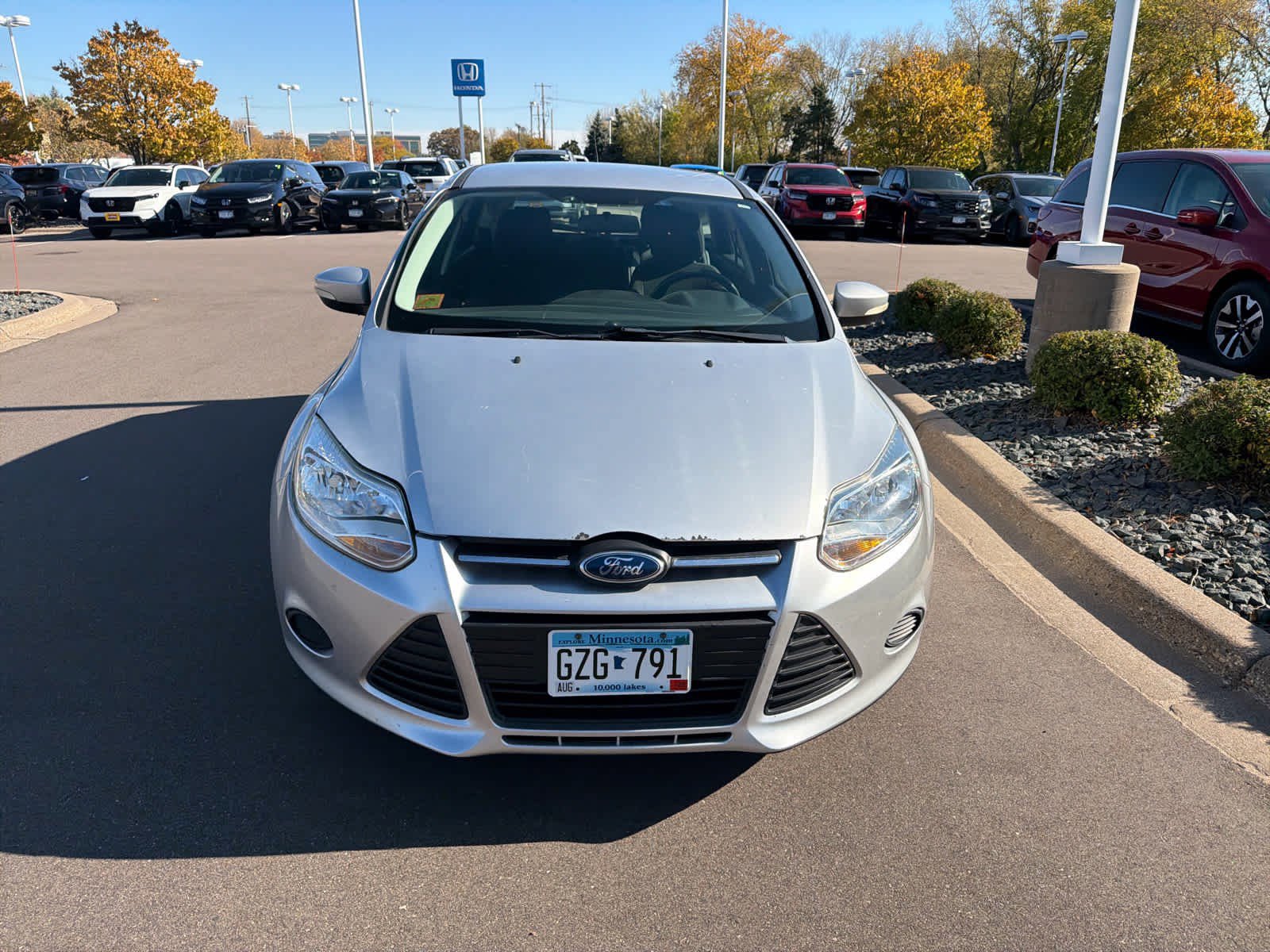 Used 2013 Ford Focus SE with VIN 1FADP3K2XDL342028 for sale in Hopkins, MN