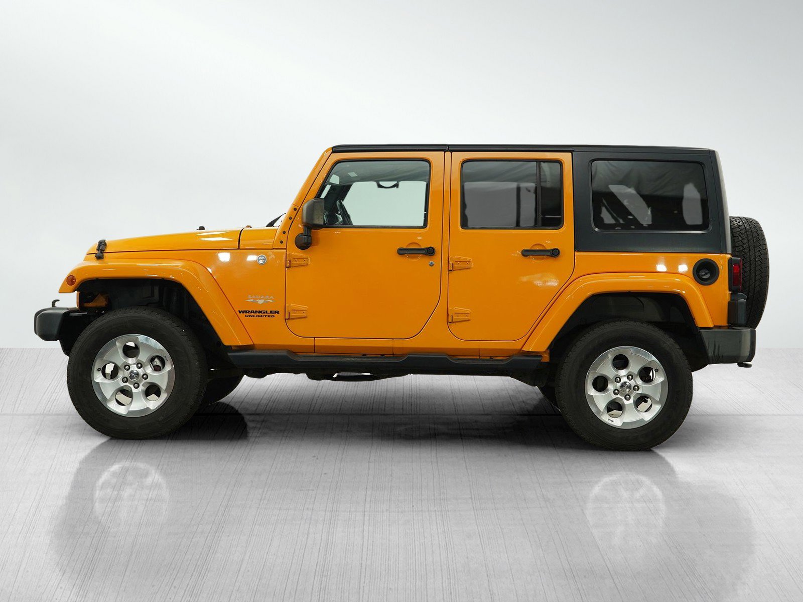 Used 2013 Jeep Wrangler Unlimited Sahara with VIN 1C4BJWEG2DL554952 for sale in Burnsville, Minnesota