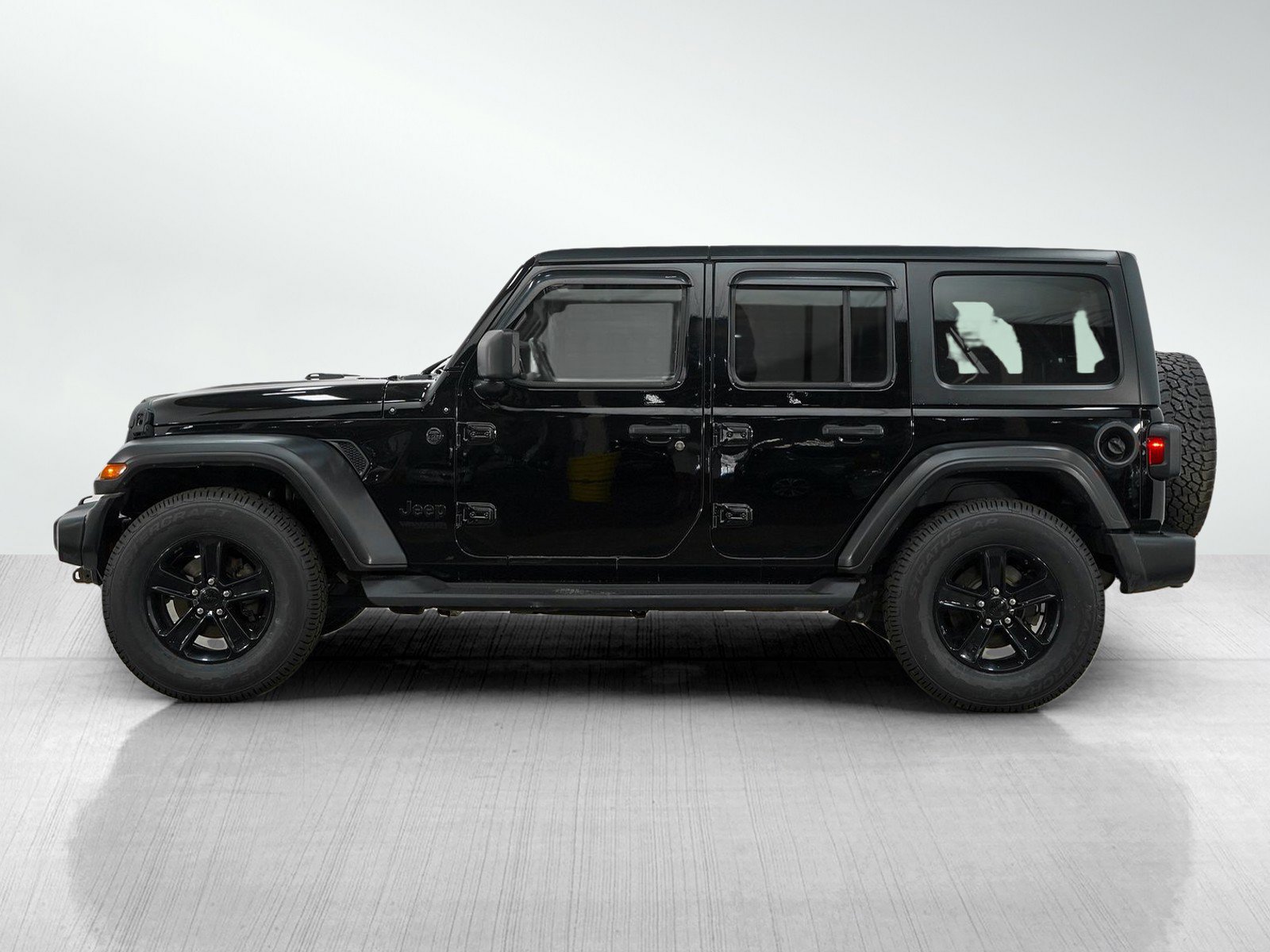 Used 2021 Jeep Wrangler Unlimited Altitude with VIN 1C4HJXDG8MW556253 for sale in Hopkins, Minnesota