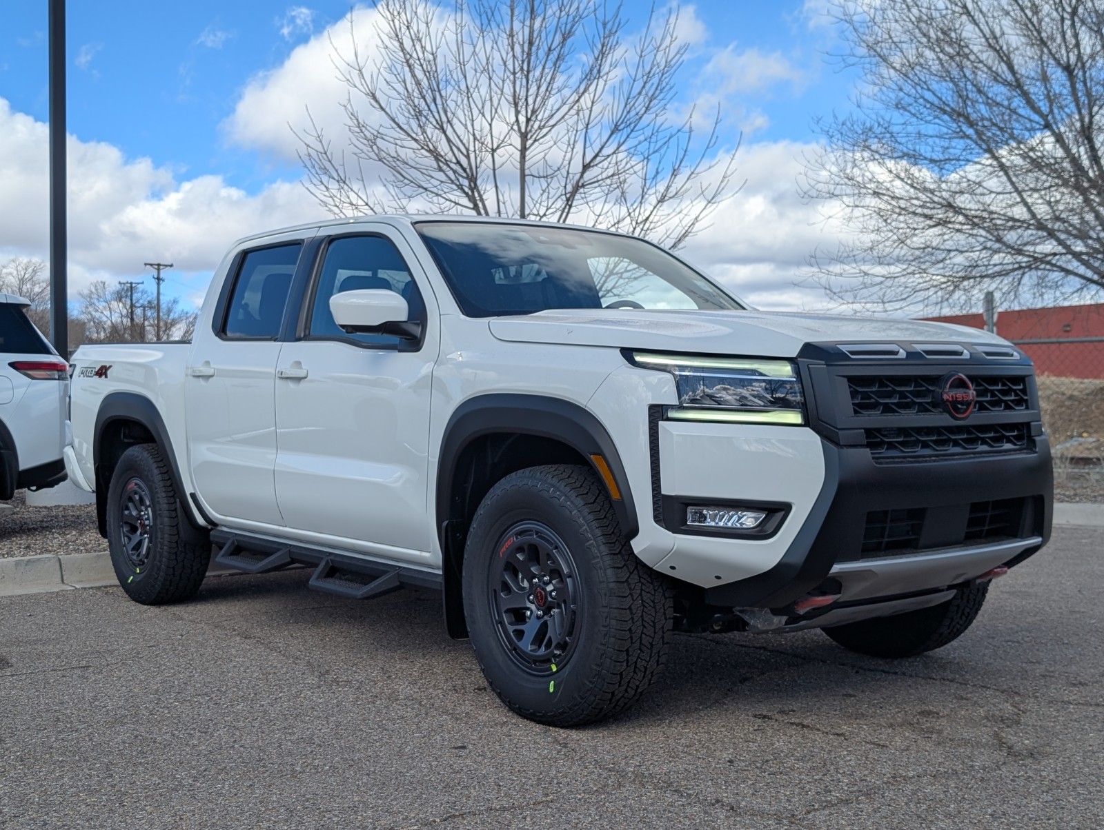 New 2025 Glacier White Nissan Crew Cab PRO-4X® image 1