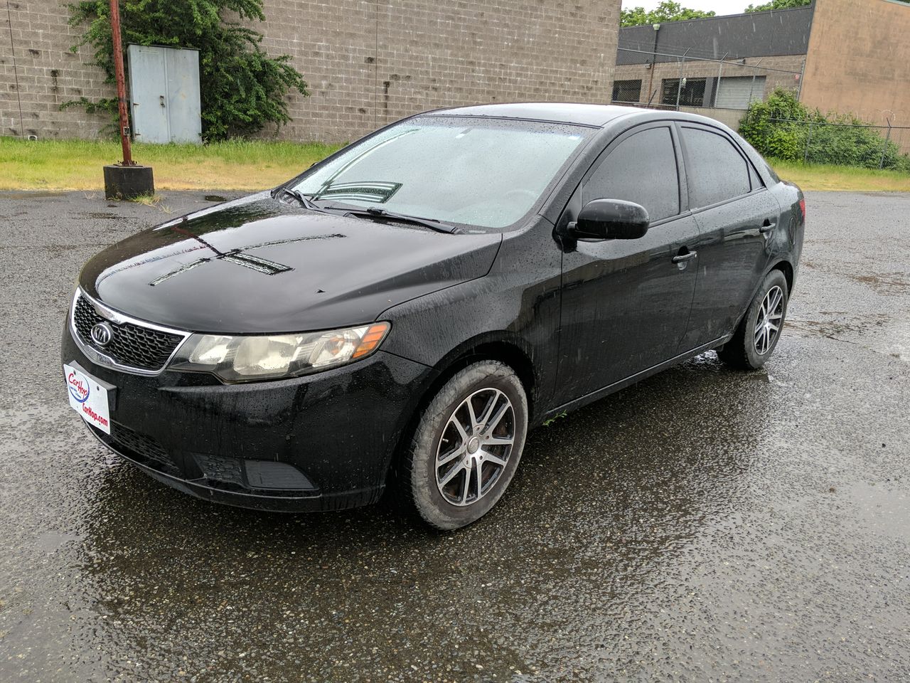 Used 2012 Black Kia LX image 1