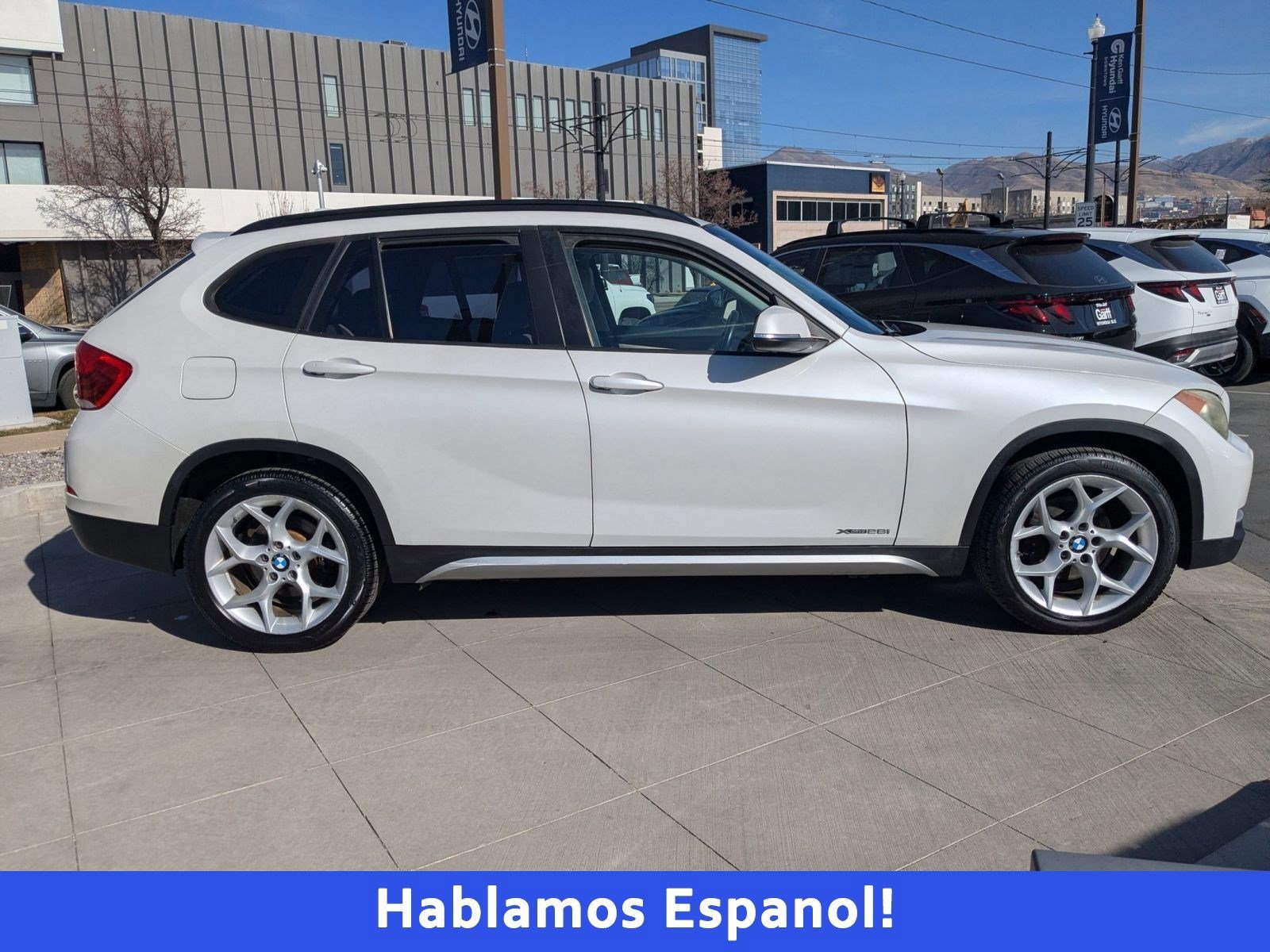 Used 2013 BMW X1 28i with VIN WBAVL1C55DVR82799 for sale in Salt Lake City, UT
