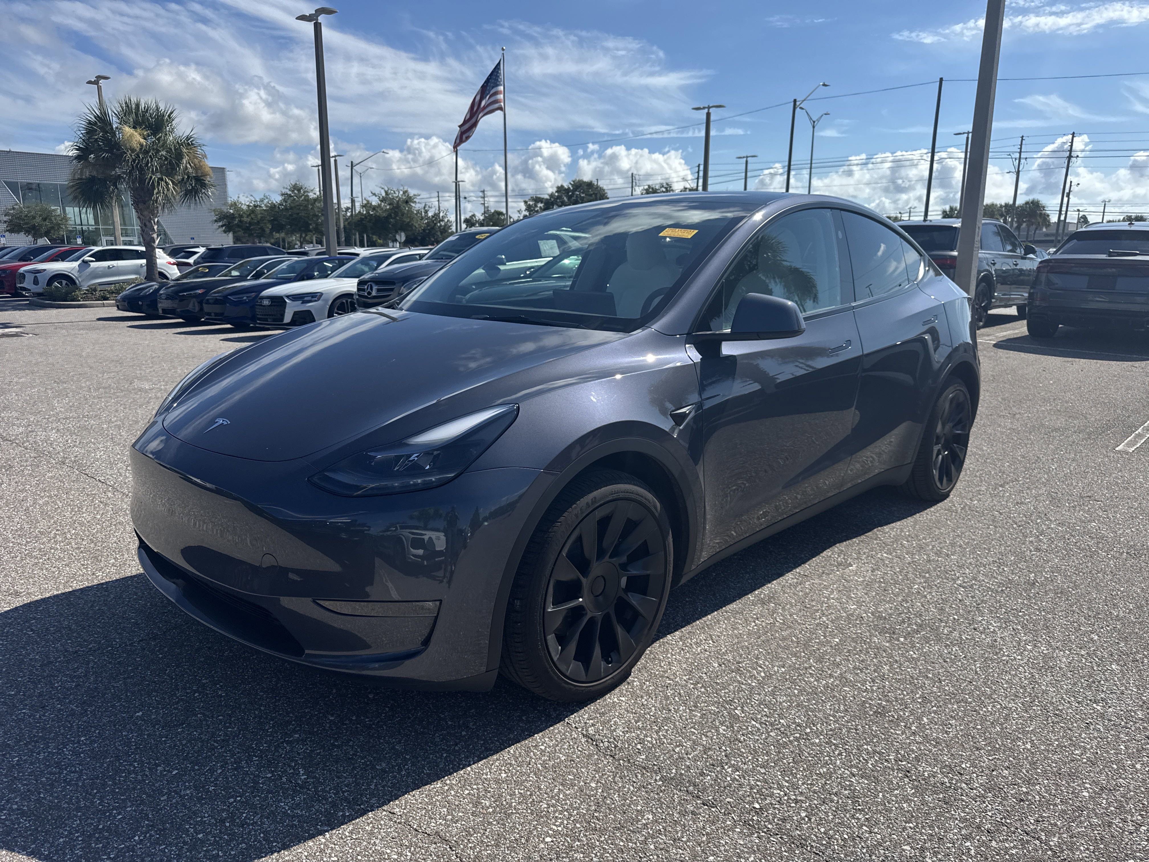 Used 2023 Tesla Model Y Long Range with VIN 7SAYGDEE7PF890277 for sale in Kansas City