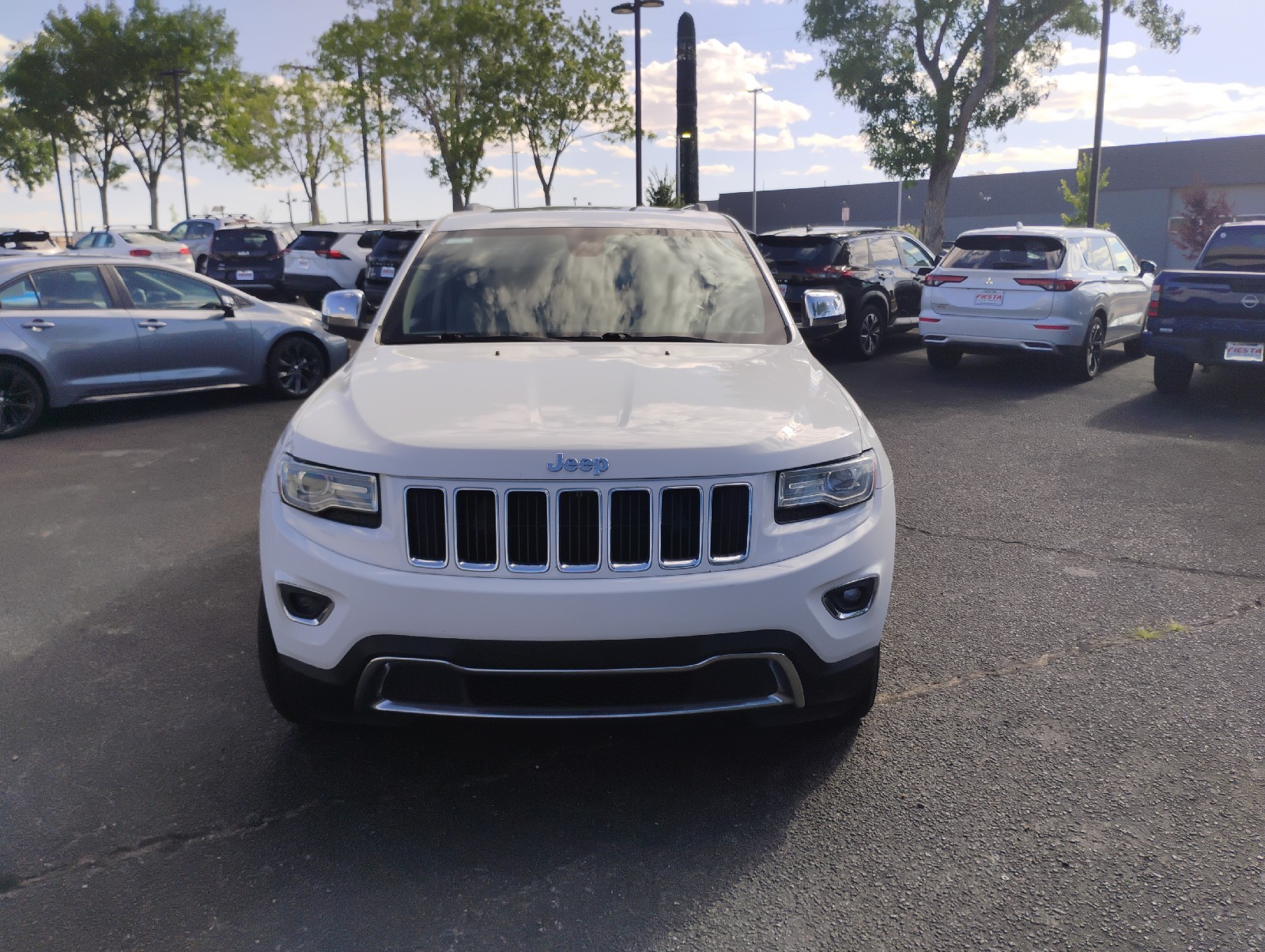 Used 2014 Bright White Clearcoat Jeep Limited image 1