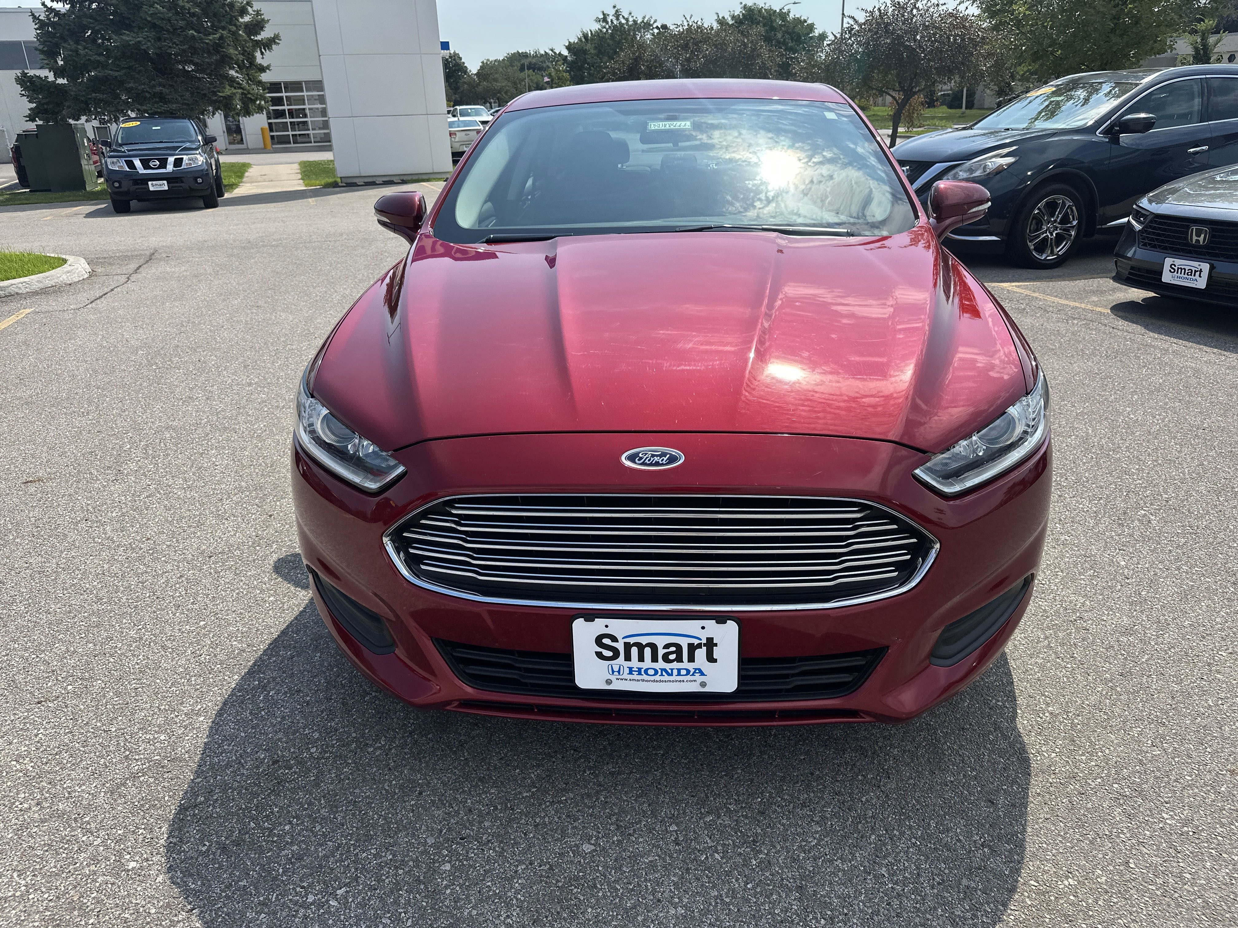Used 2015 Ford Fusion SE with VIN 3FA6P0H73FR108666 for sale in Des Moines, IA