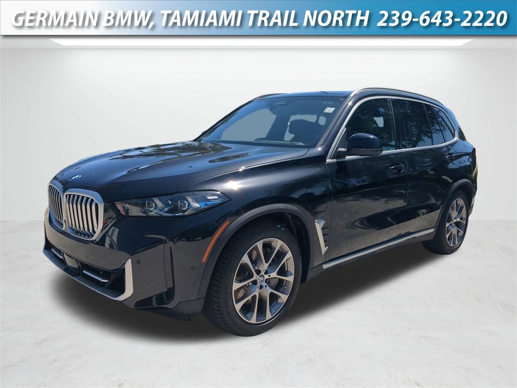 New 2026 Black Sapphire Metallic BMW xDrive50e image 1