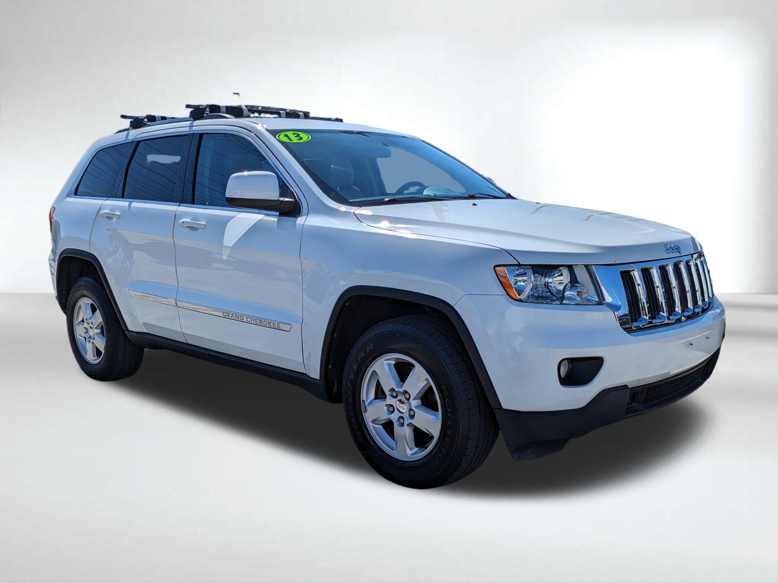 Used 2013 Jeep Grand Cherokee Laredo with VIN 1C4RJEAG0DC632272 for sale in Seminole, FL