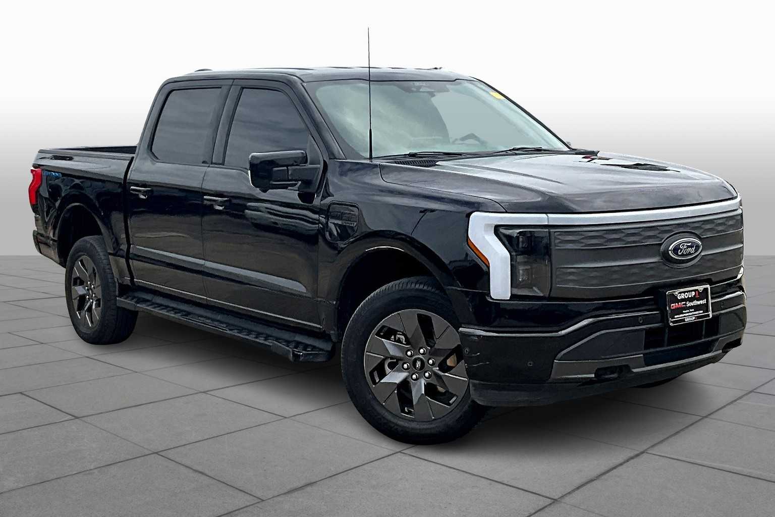 Used 2022 Ford F-150 Lightning Lariat with VIN 1FTVW1EL5NWG15208 for sale in Houston, TX