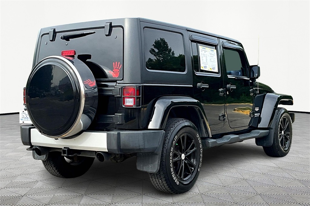 Used 2013 Jeep Wrangler Unlimited Sahara with VIN 1C4BJWEG8DL631212 for sale in Kansas City