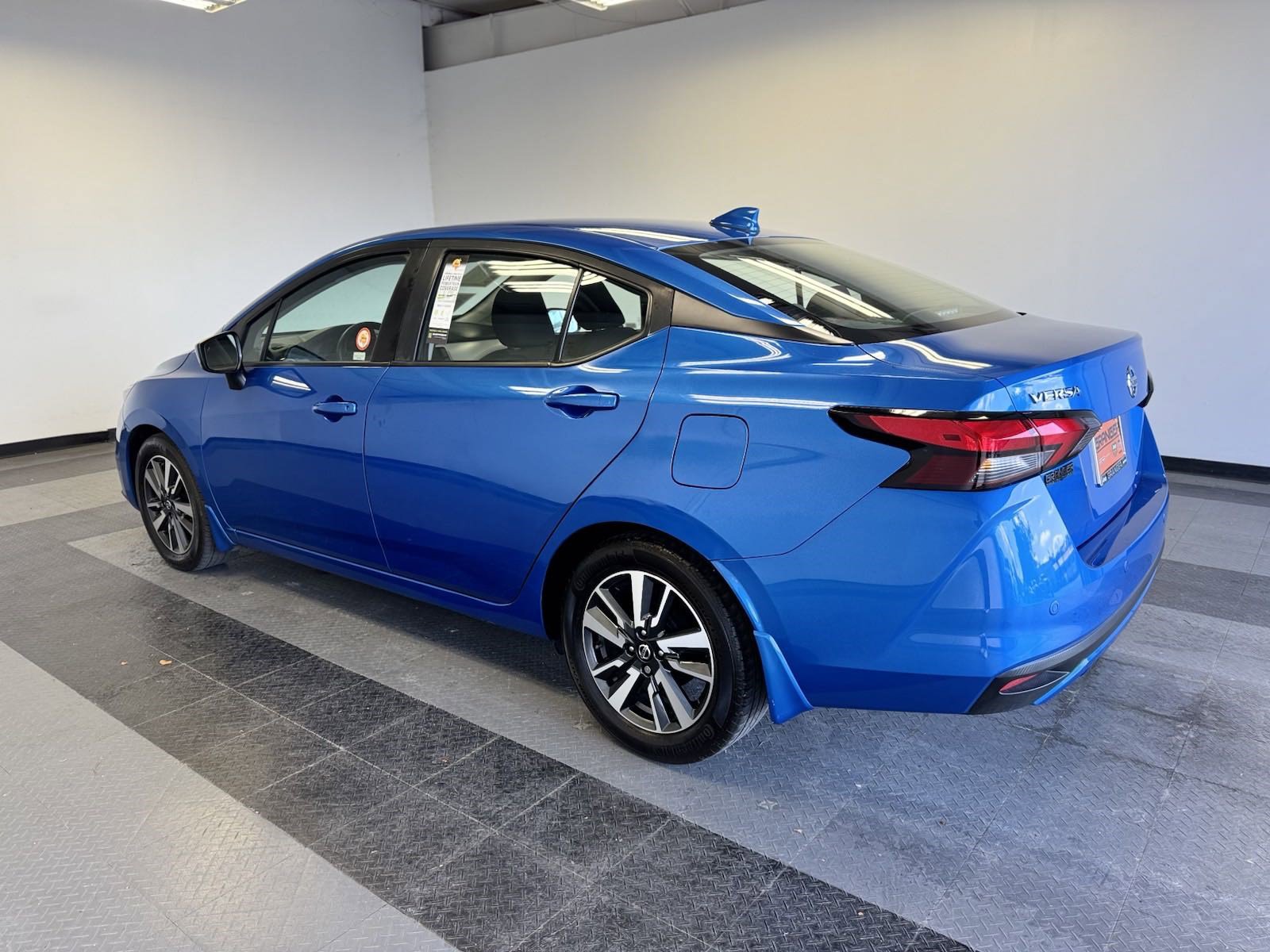 PreOwned 2022 Nissan Versa SV 4dr Car in Orange P867167 Granger