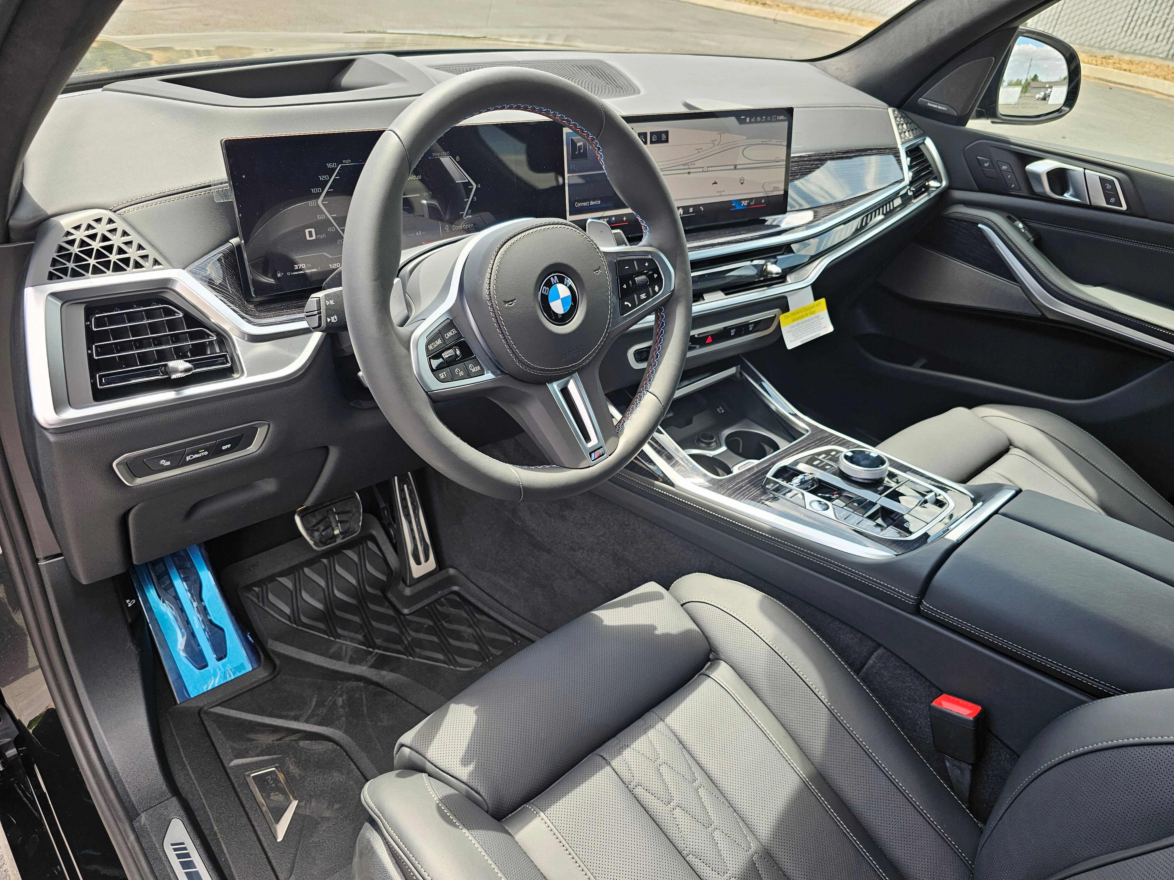 New 2026 Black Sapphire Metallic BMW M60i image 2