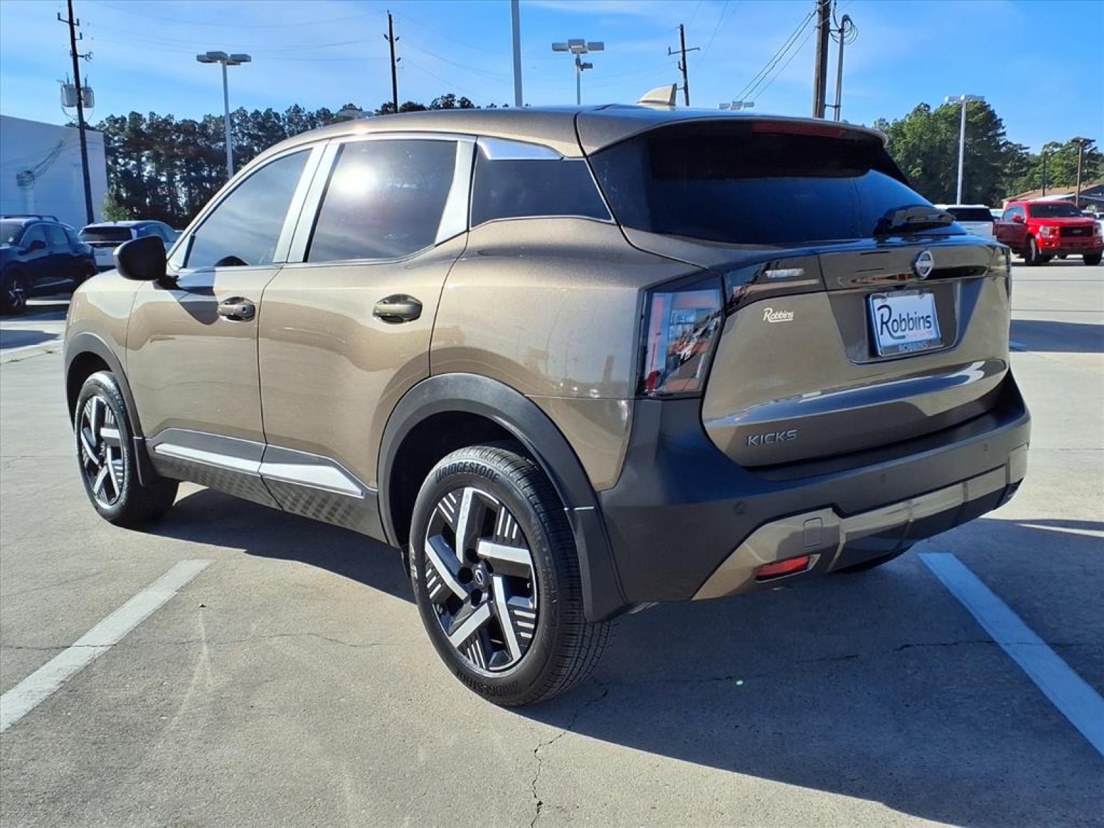 2025 Nissan Kicks SV Brown at Robbins Nissan