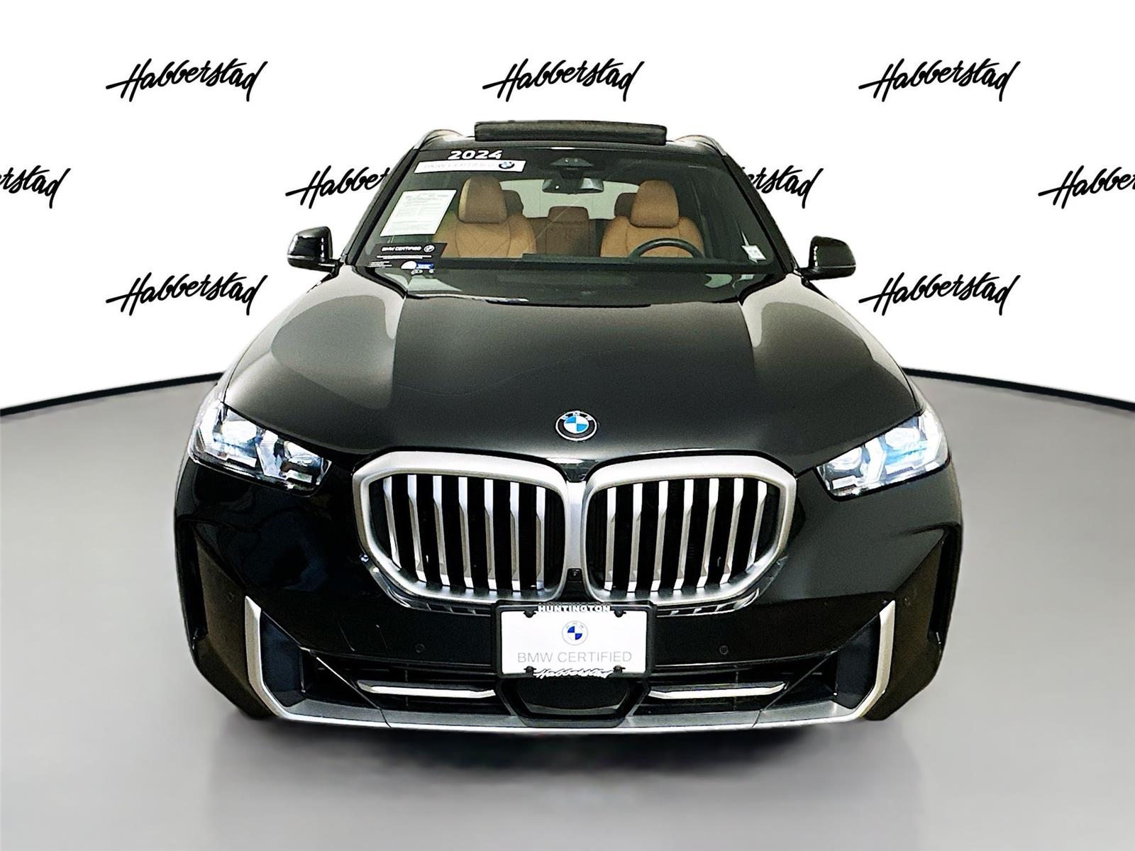 Certified Used 2025 Black Sapphire Metallic BMW xDrive40i image 2