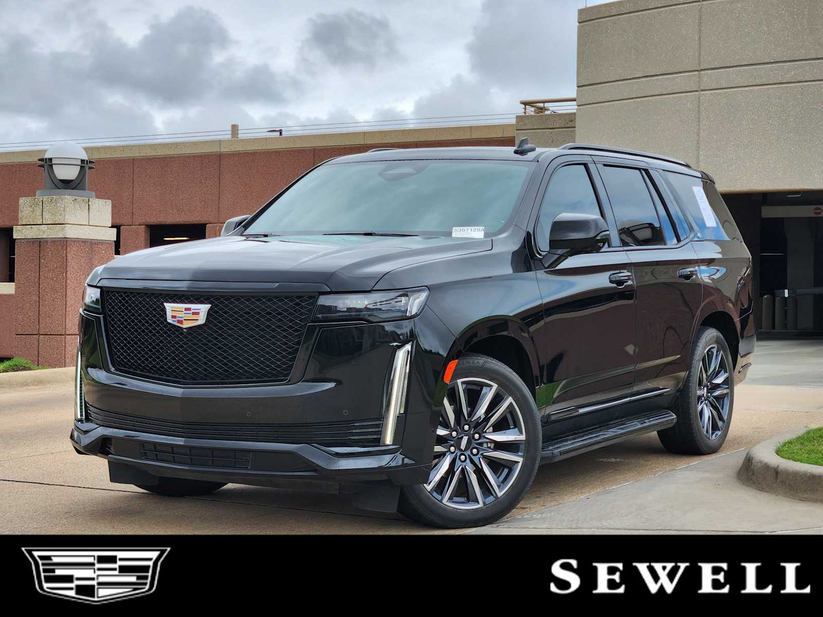 Used 2023 Black Raven Cadillac Sport image 1