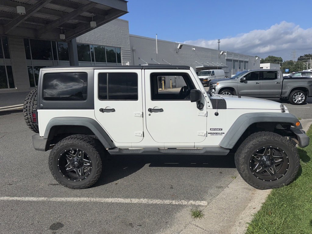 Used 2013 Jeep Wrangler Unlimited Sport with VIN 1C4BJWDG4DL513739 for sale in Kernersville, NC