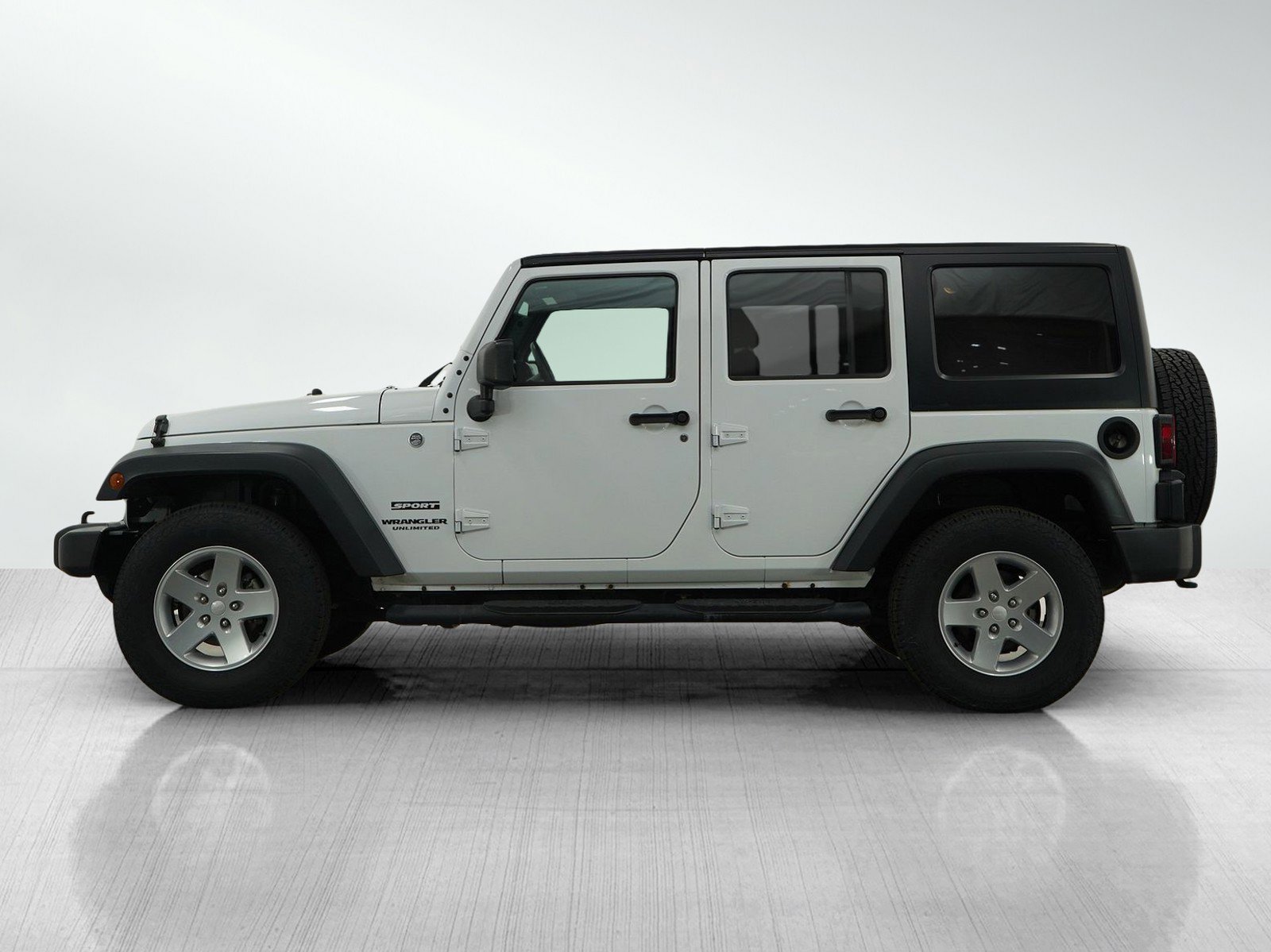 Used 2015 Jeep Wrangler Unlimited Sport with VIN 1C4BJWDG5FL759136 for sale in Hopkins, Minnesota