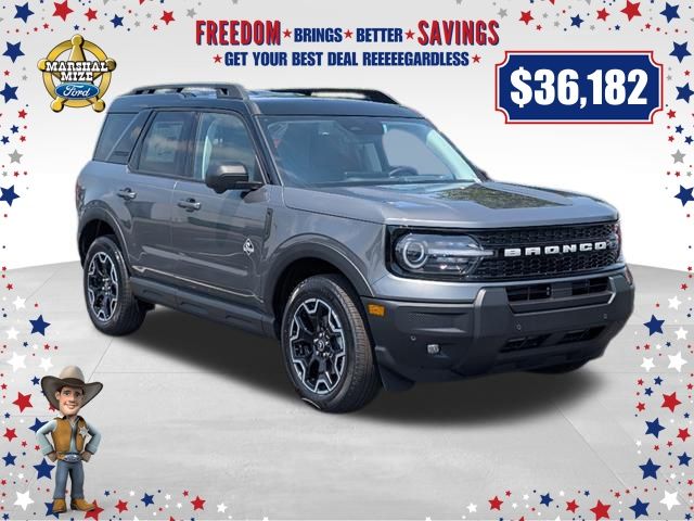 New 2025 Carbonized Gray Metallic Ford Outer Banks image 1