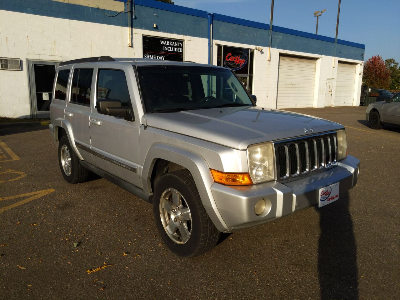 Used 2010 Silver Jeep Sport Utility 4D image 1