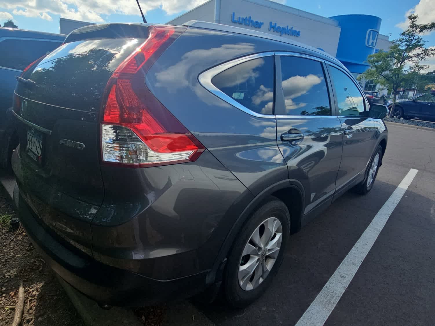 Used 2014 Honda CR-V EX-L with VIN 2HKRM4H78EH625485 for sale in Hopkins, Minnesota