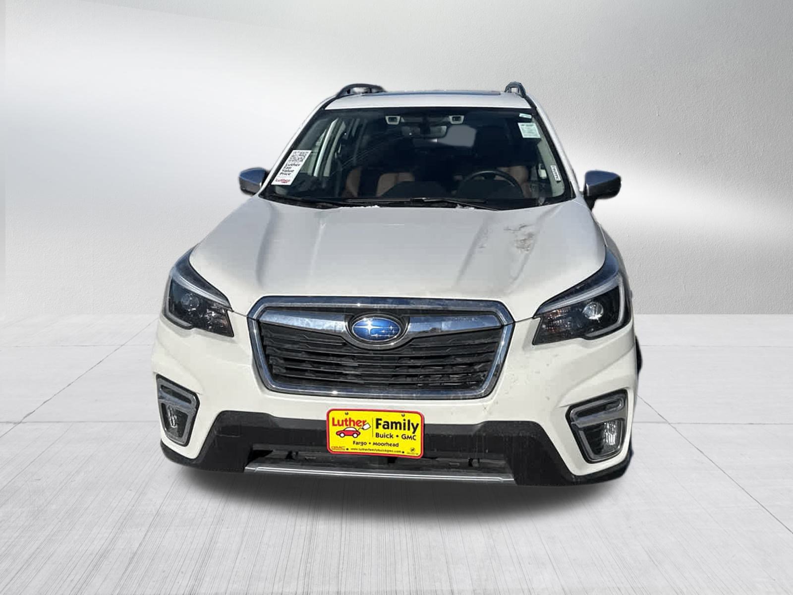 Used 2021 Subaru Forester Touring with VIN JF2SKAXC0MH485533 for sale in Brooklyn Center, Minnesota