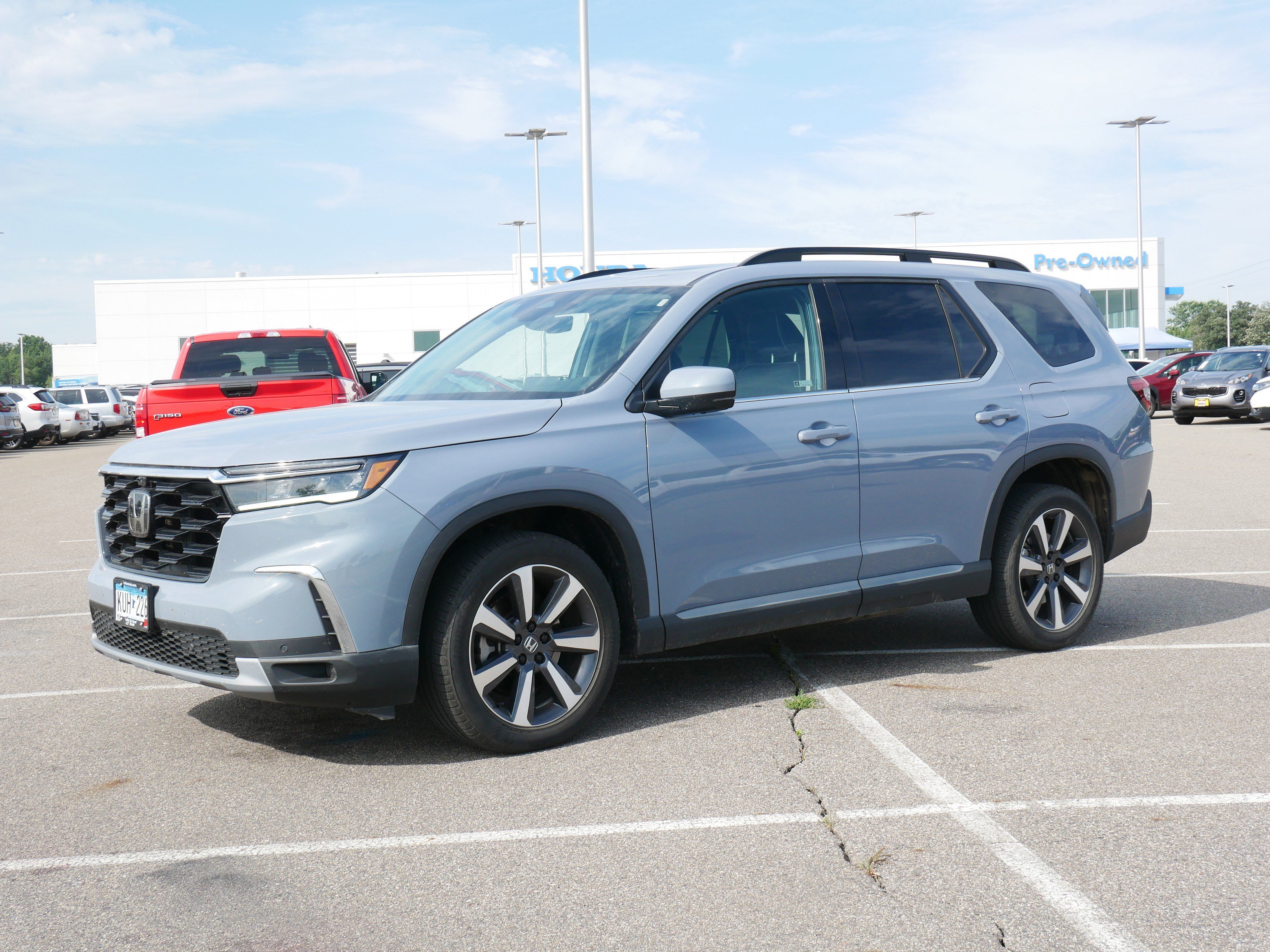 Used 2023 Honda Pilot Elite with VIN 5FNYG1H82PB031339 for sale in Waite Park, Minnesota