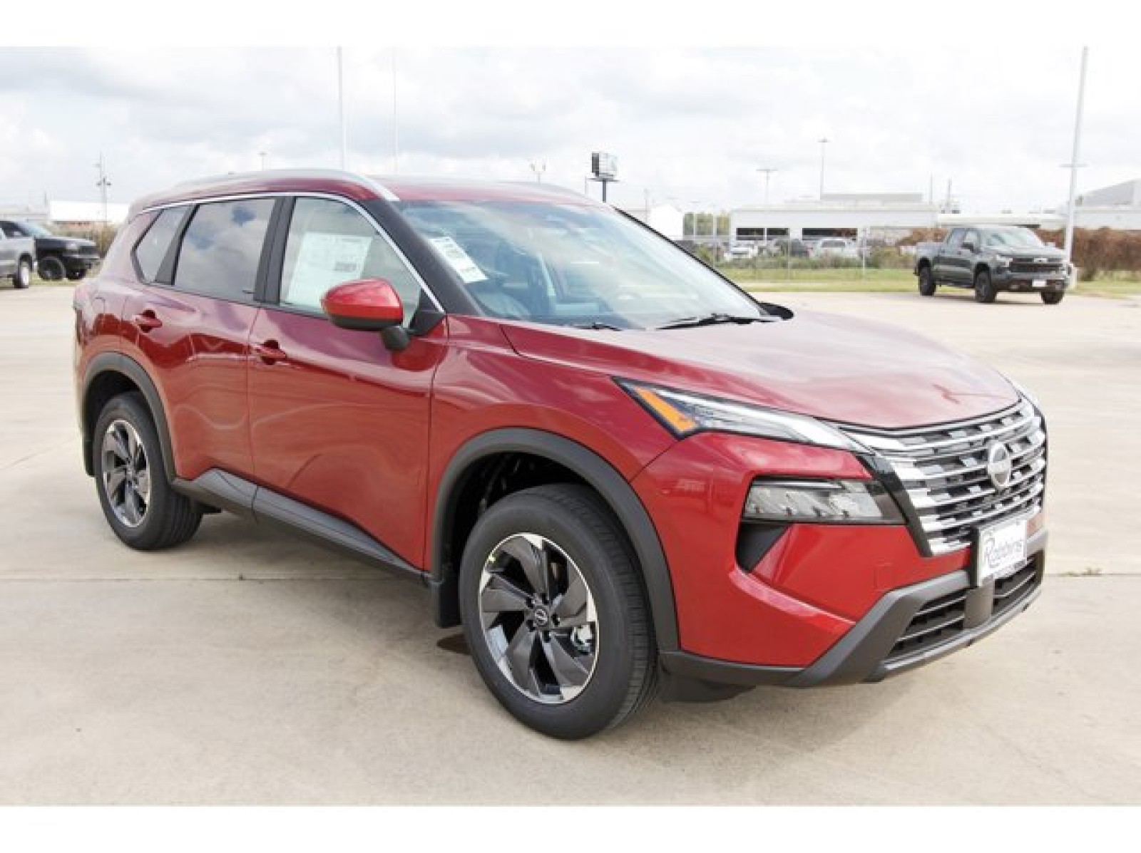 2026 Nissan Rogue SV Red at Robbins Nissan