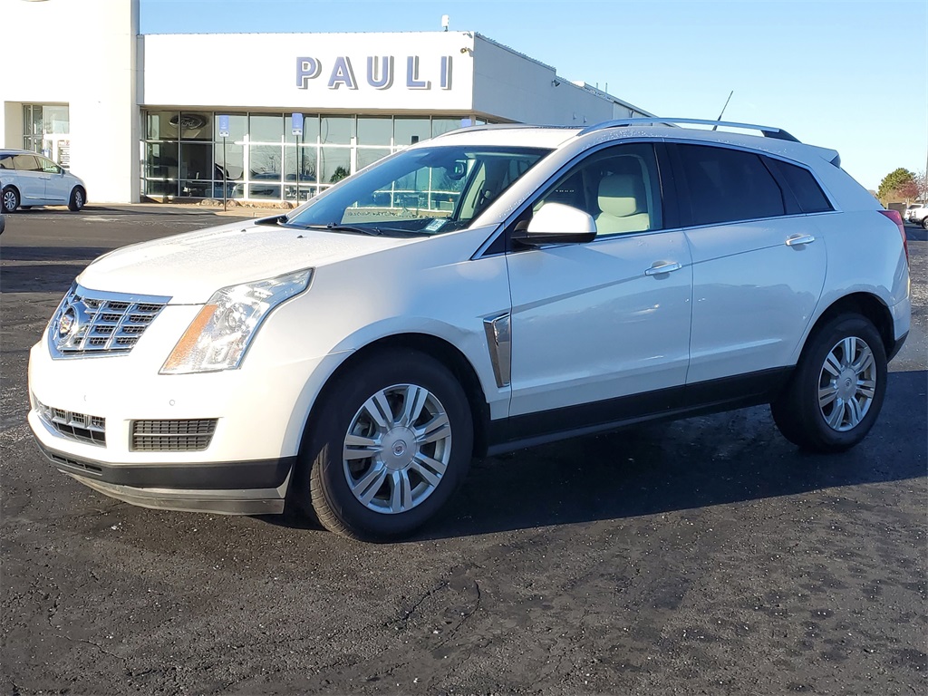 Used 2013 Cadillac SRX Luxury Collection with VIN 3GYFNCE37DS579724 for sale in Saint Johns, MI
