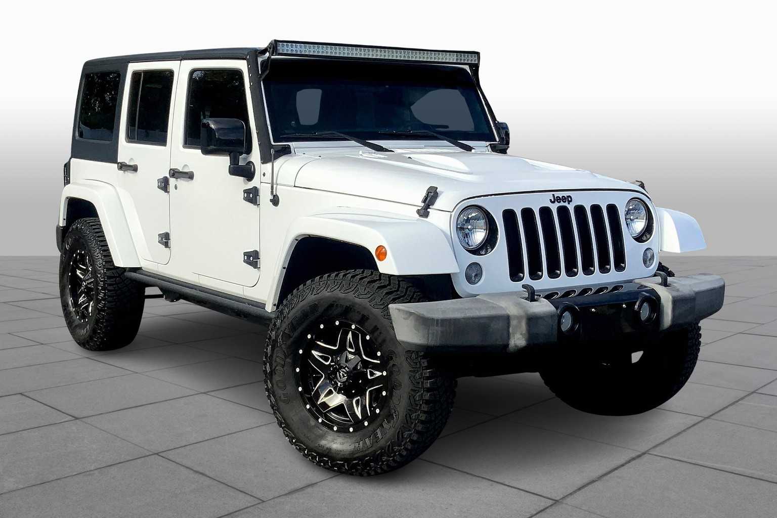Used 2015 Jeep Wrangler Unlimited Altitude with VIN 1C4HJWEG9FL716962 for sale in Auburn, MA