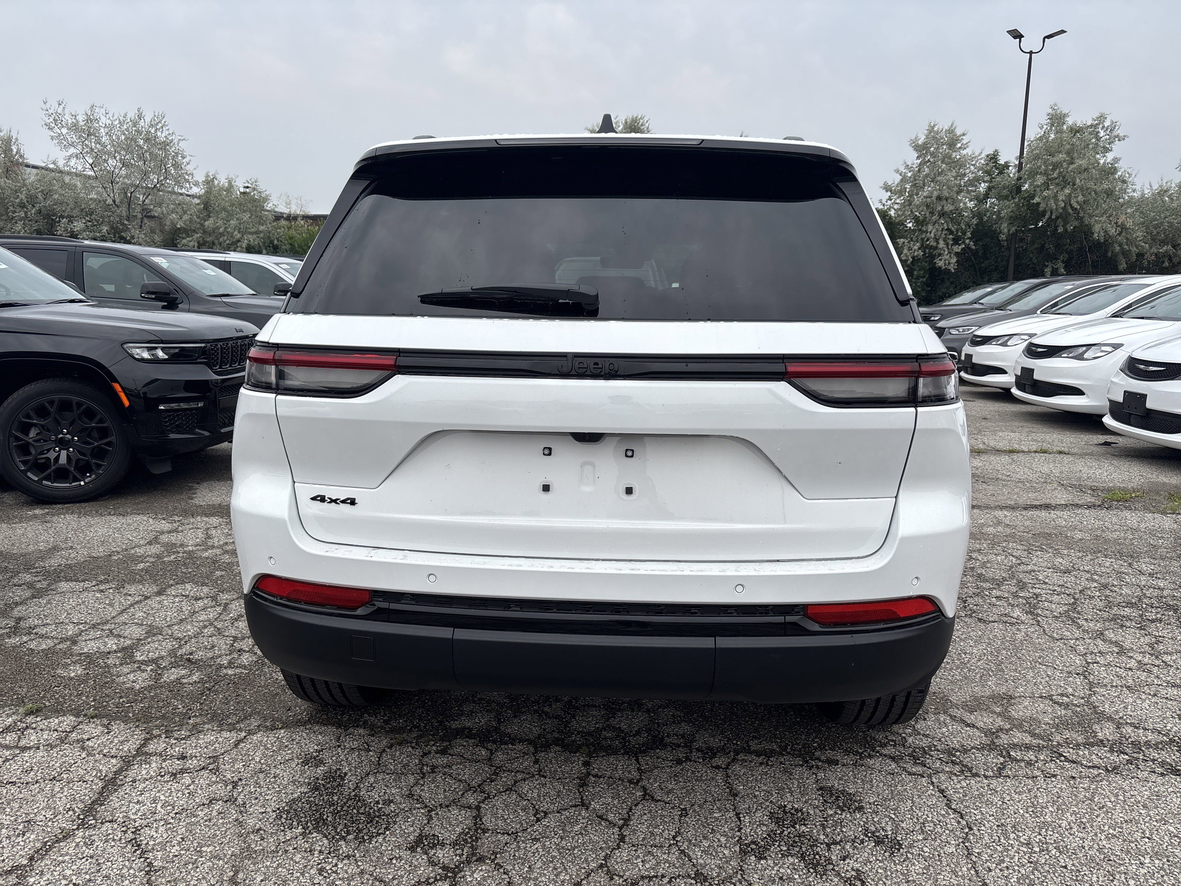 New 2025 Bright White Jeep Altitude image 1