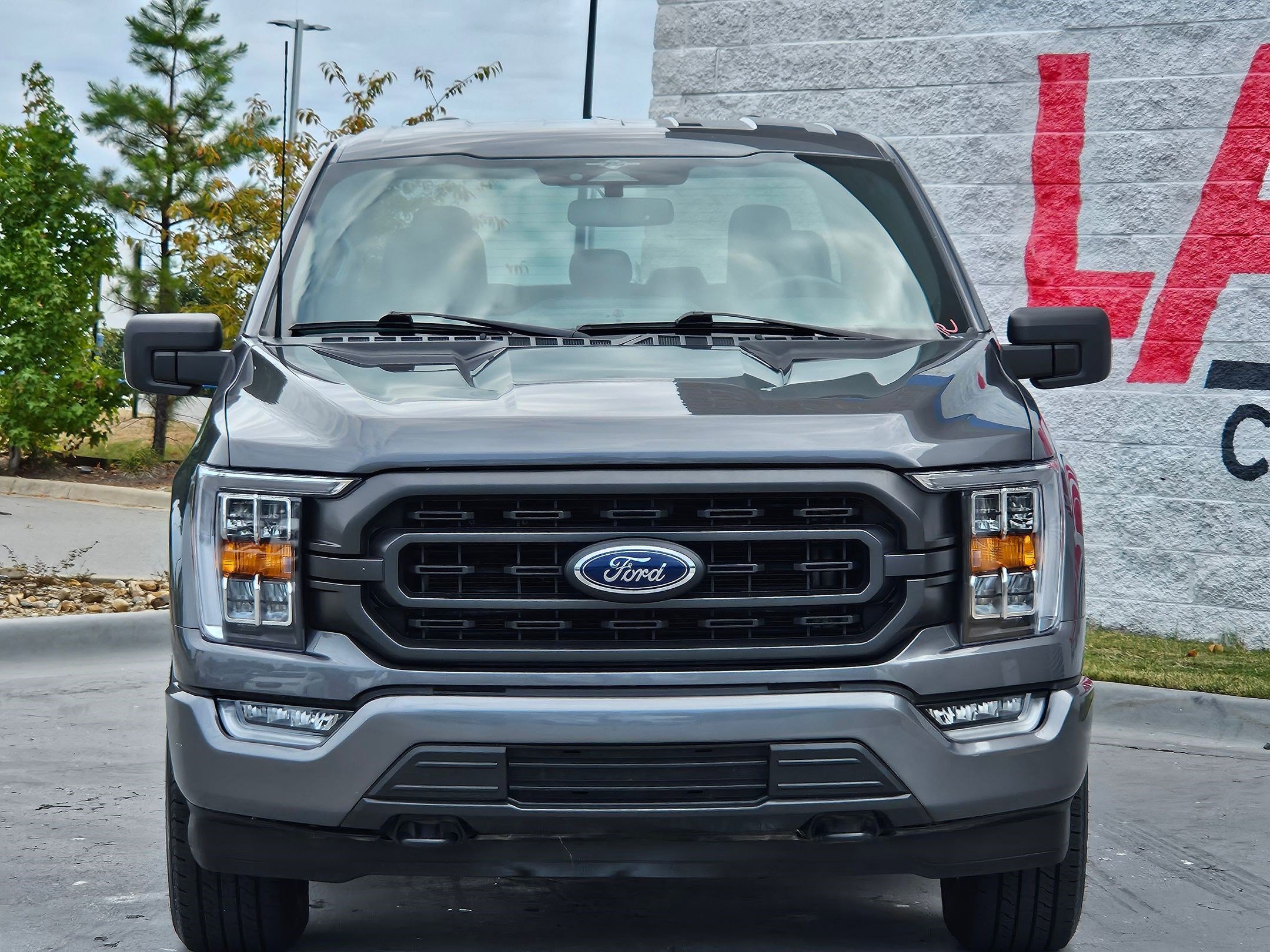 Used 2023 Ford F-150 XLT with VIN 1FTFW1E55PFA66232 for sale in Little Rock