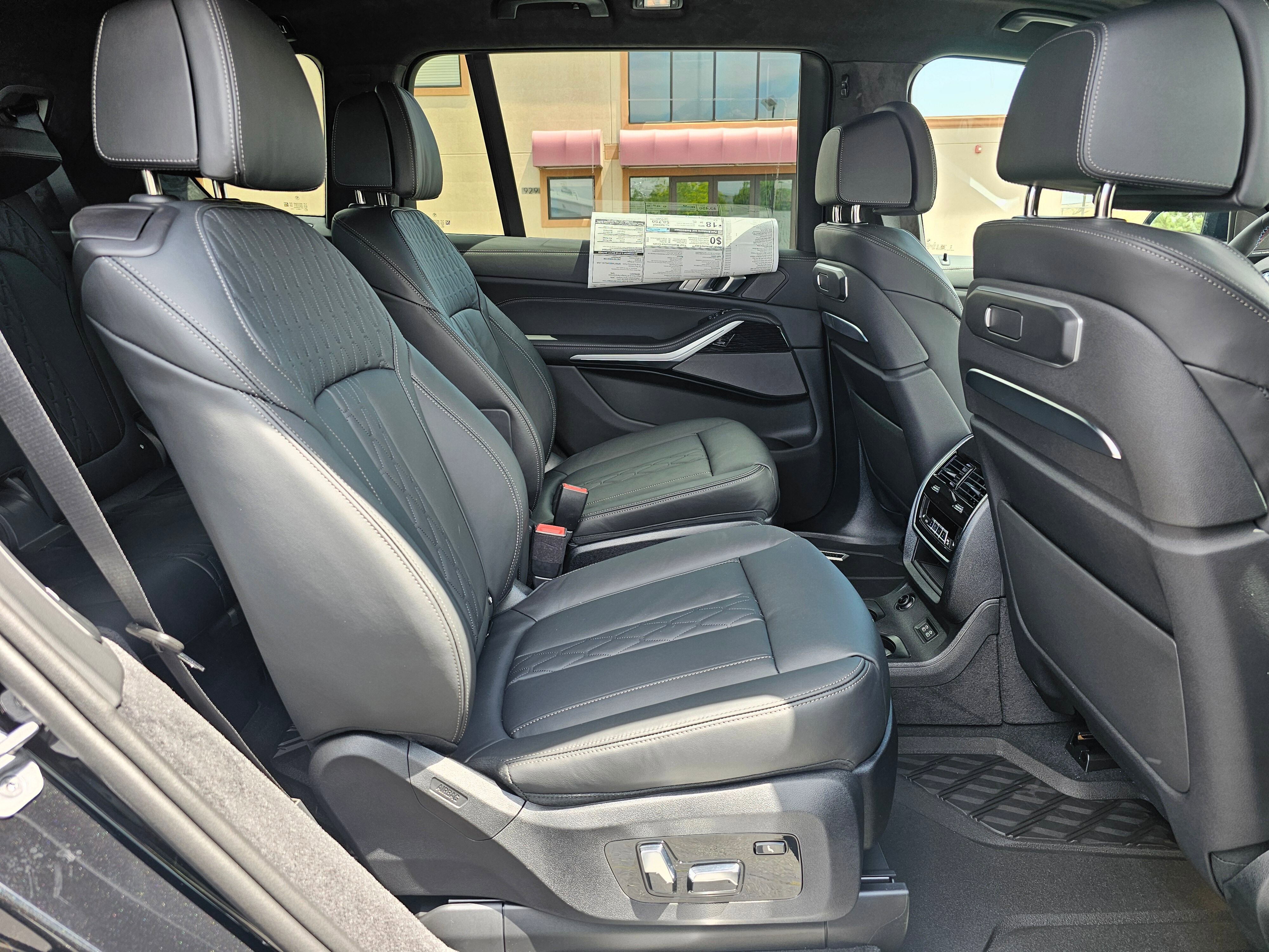 New 2026 Black Sapphire Metallic BMW M60i image 14