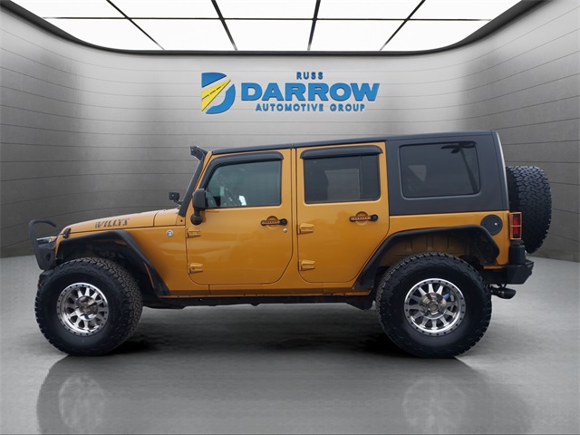 Used 2014 Jeep Wrangler Unlimited Sport with VIN 1C4BJWDG3EL247048 for sale in West Bend, WI
